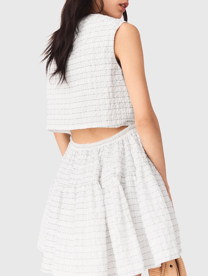 Robe courte &eacute;vas&eacute;e et dos ouvert