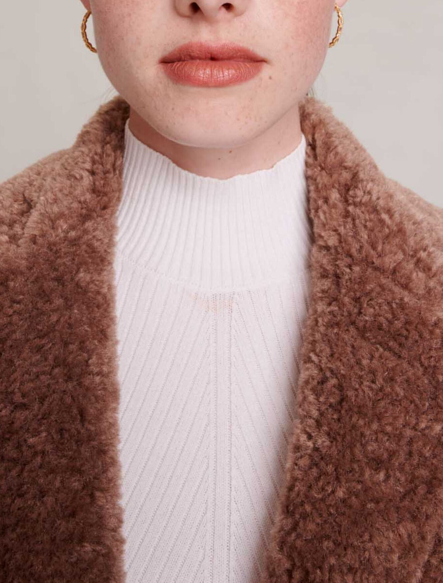 Manteau long fausse fourrure