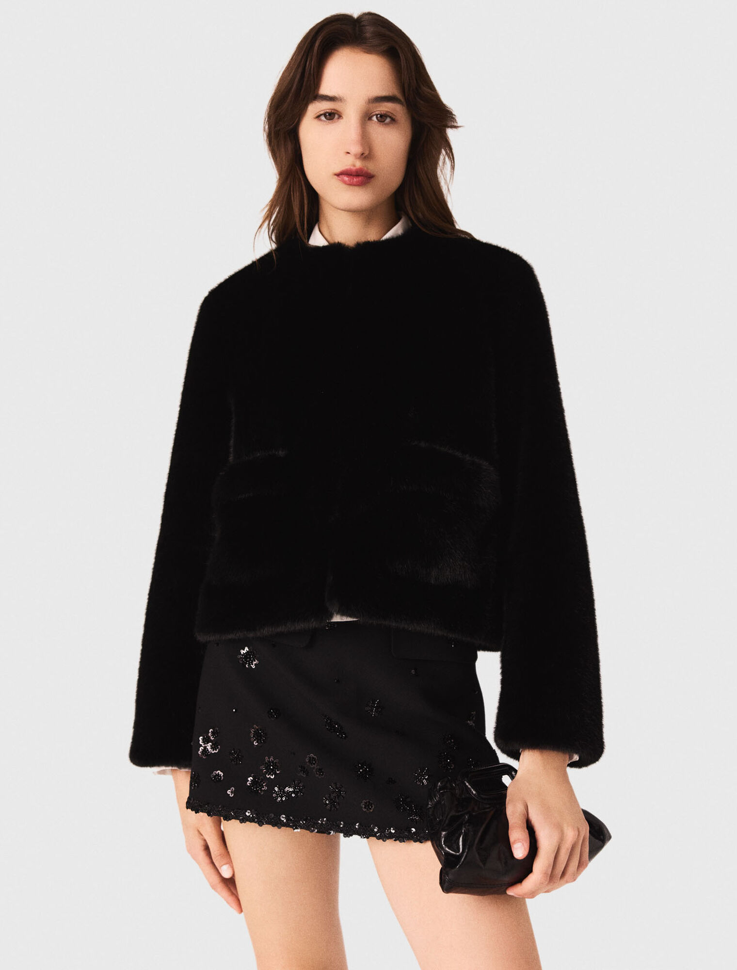 Manteau court en fausse fourrure