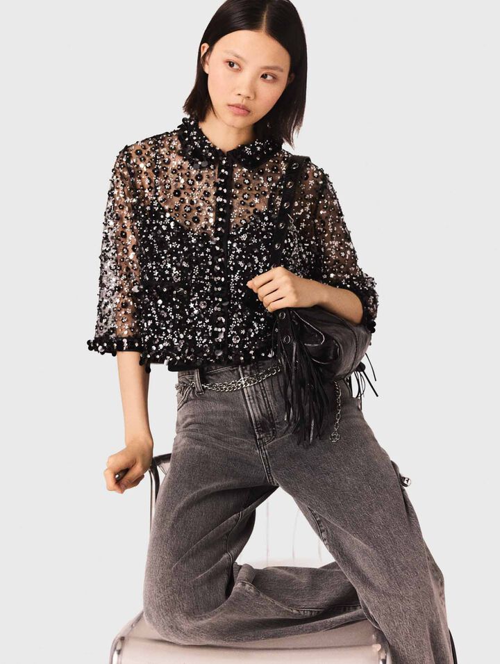 Polo strassé à motif floreal