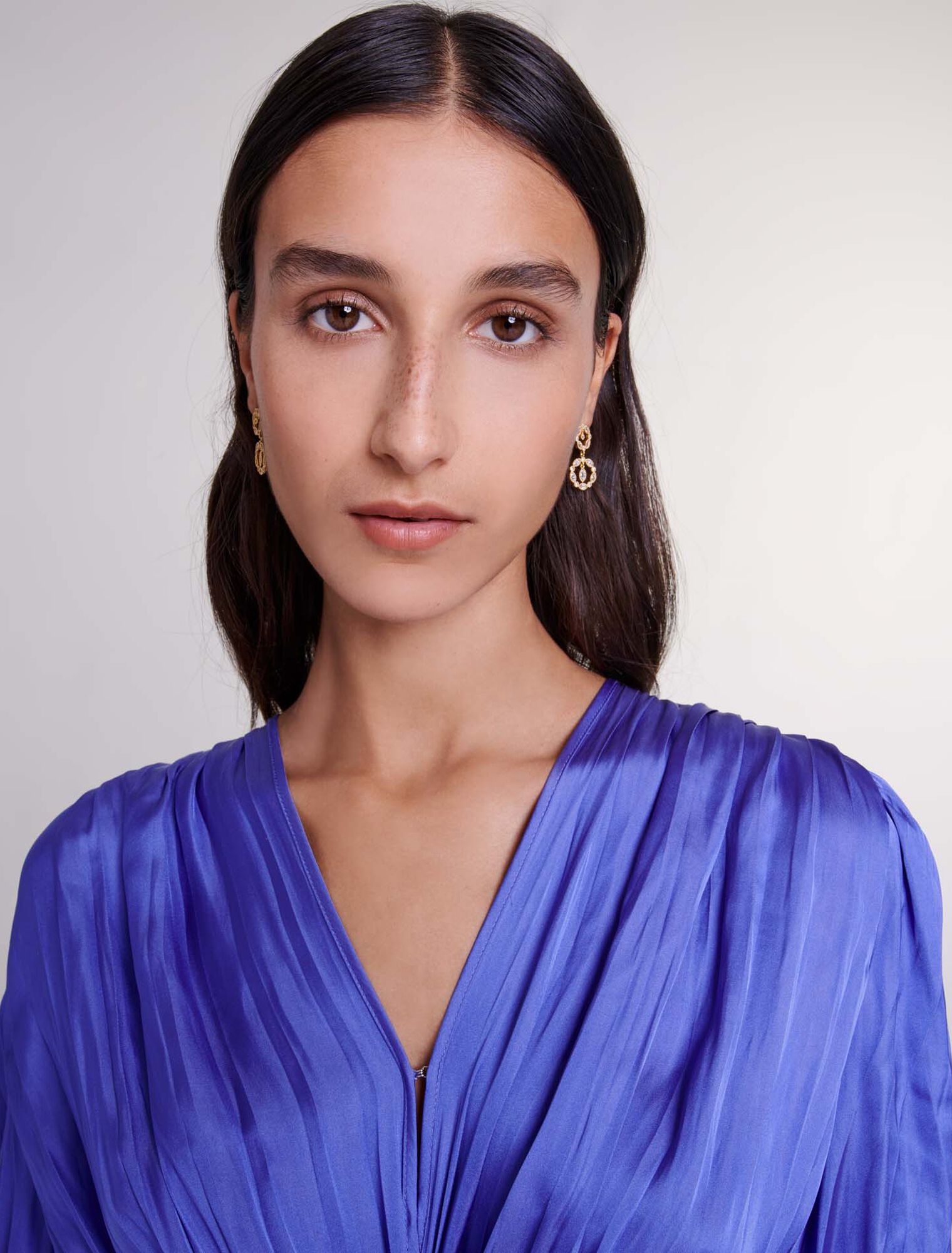 Robe longue satinée drapée