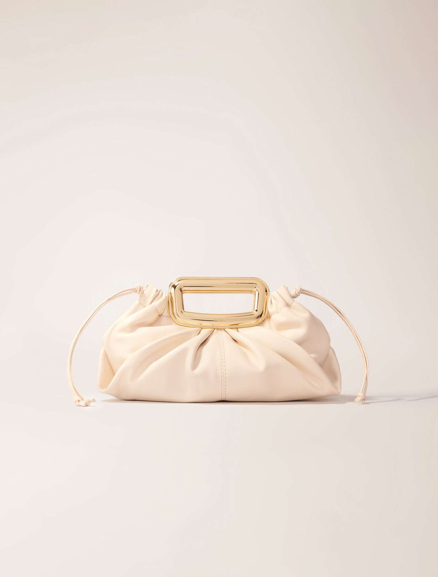 Clutch en cuir et poignée métal