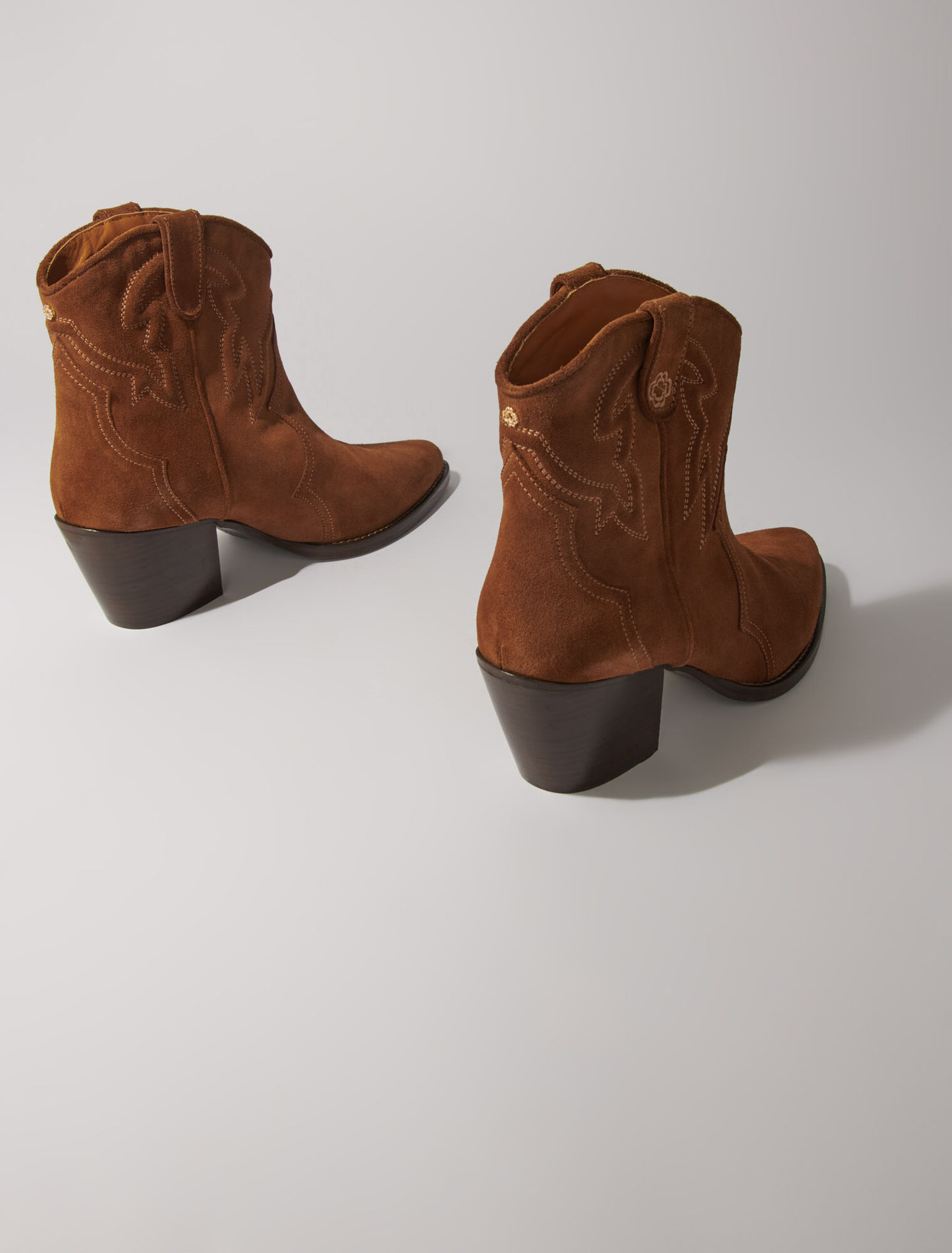 Bottines santiags en cuir suédé