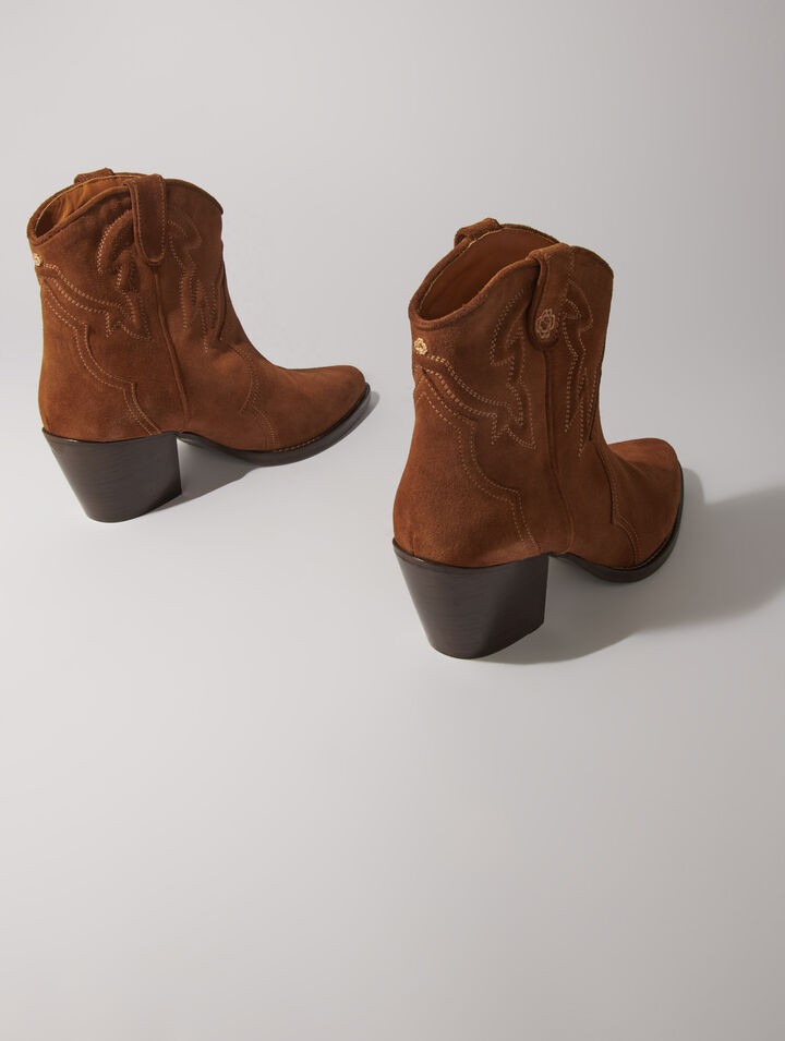 Bottines santiags en cuir suédé
