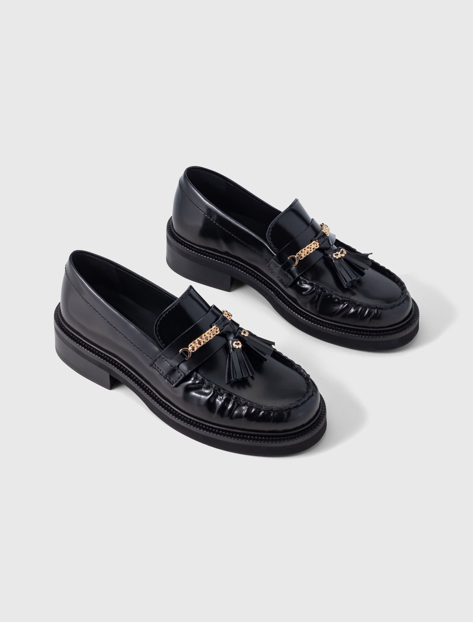 Mocassins en cuir &agrave; bords pliss&eacute;s