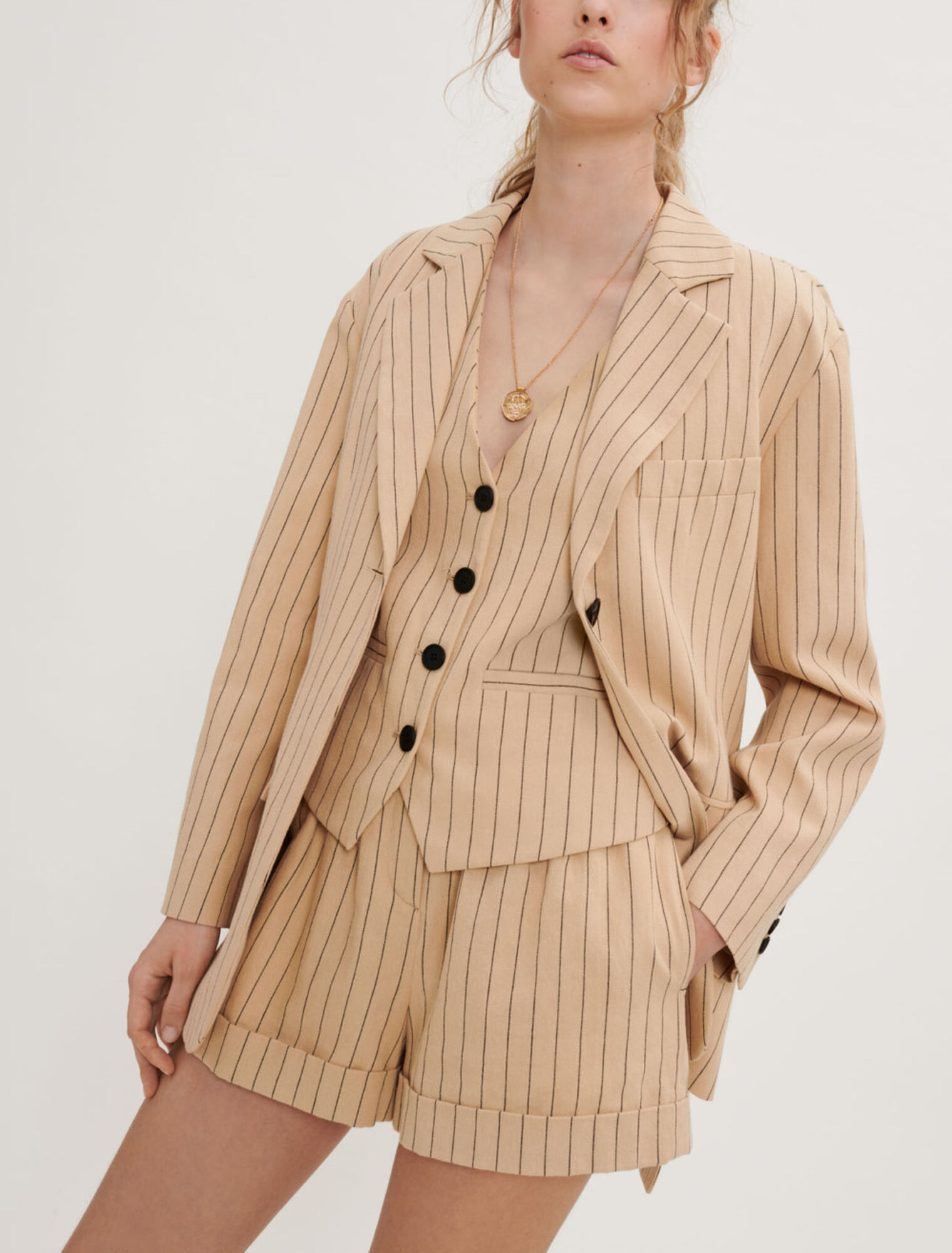 Veste à rayures ceinturée
