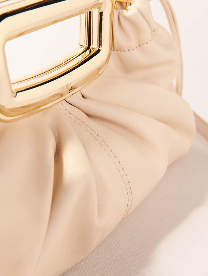 Clutch en cuir et poignée métal