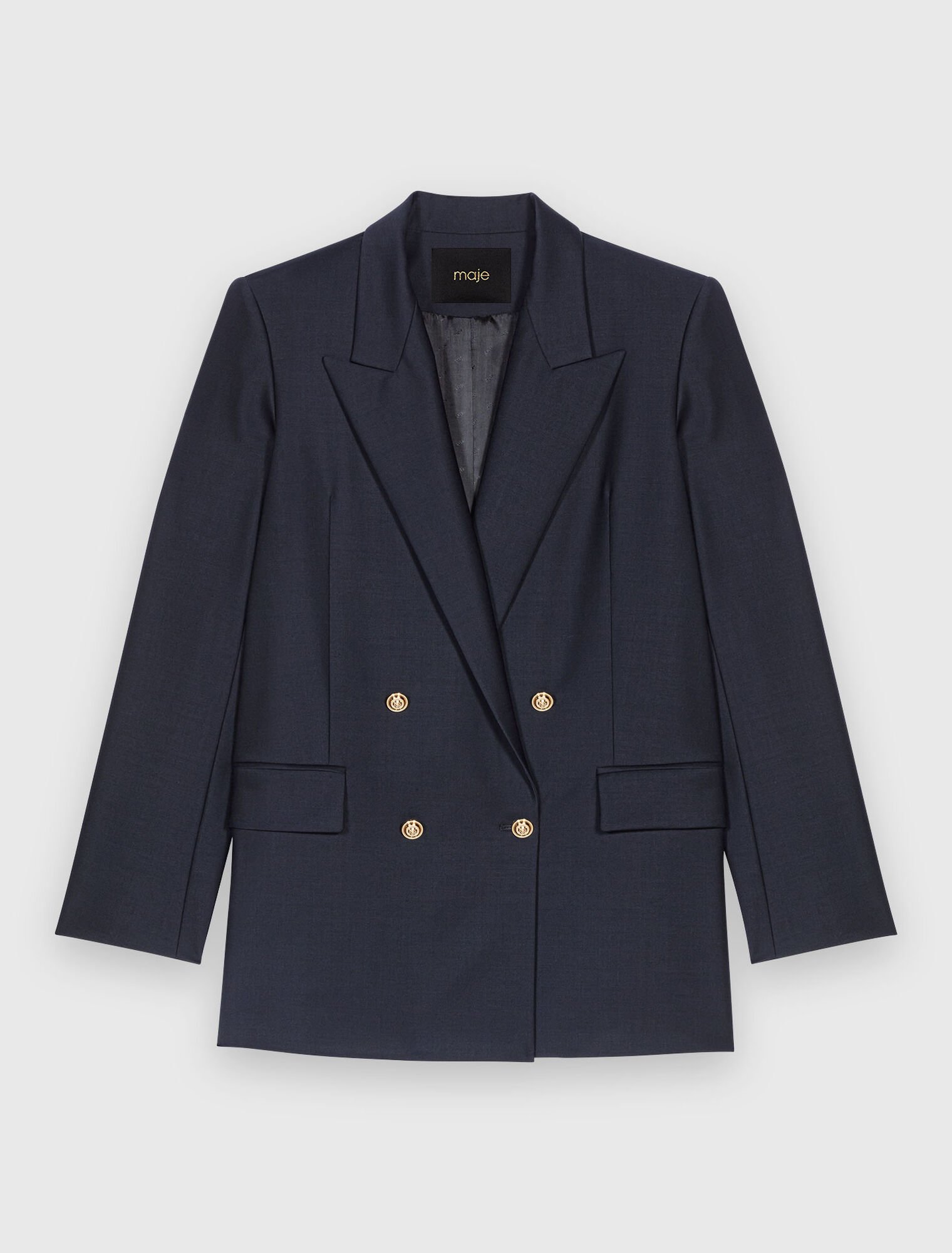 Veste tailleur à boutons dorés