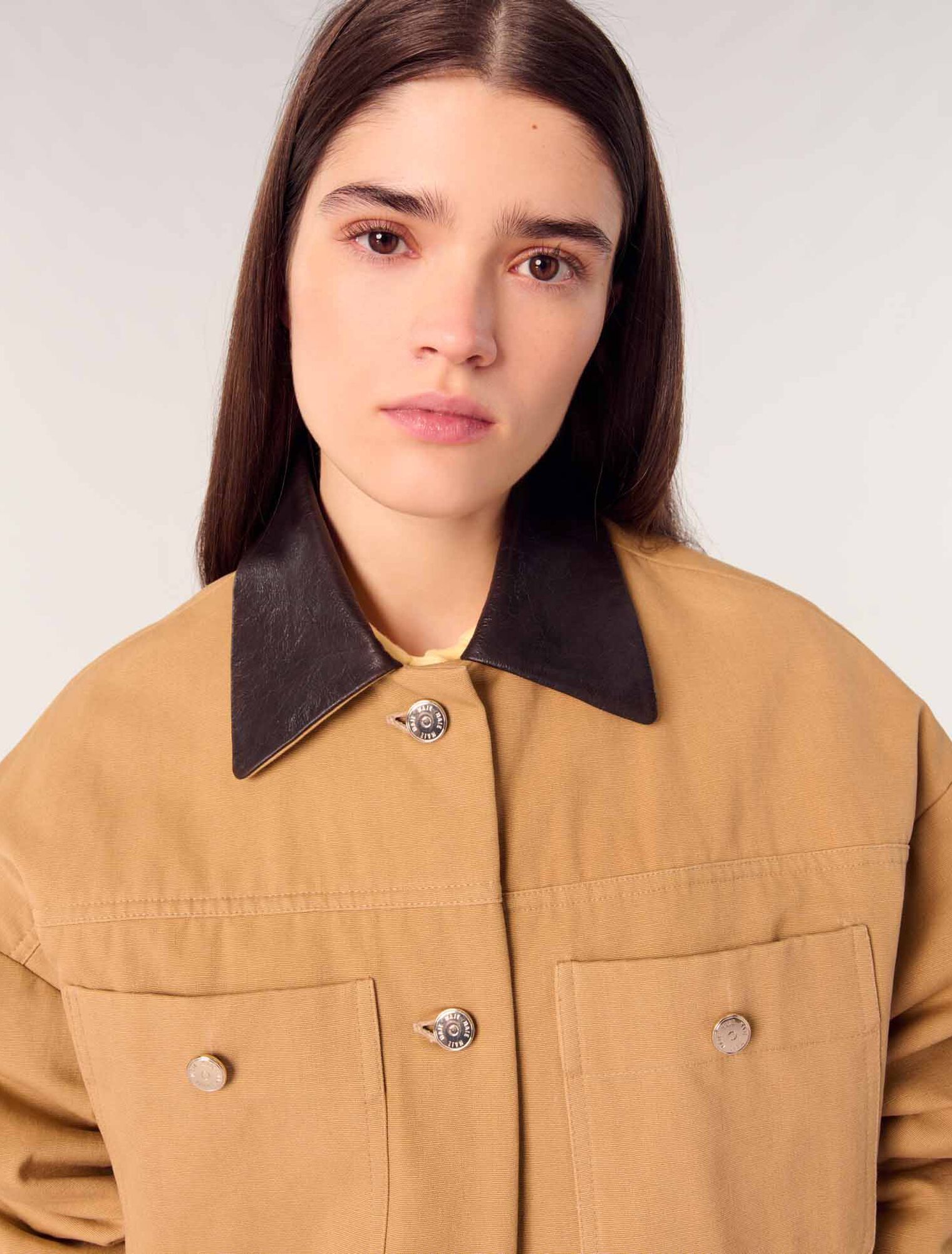 Manteau en coton et col en cuir