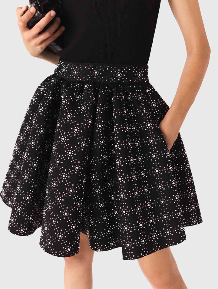 Jupe patineuse à perles et strass