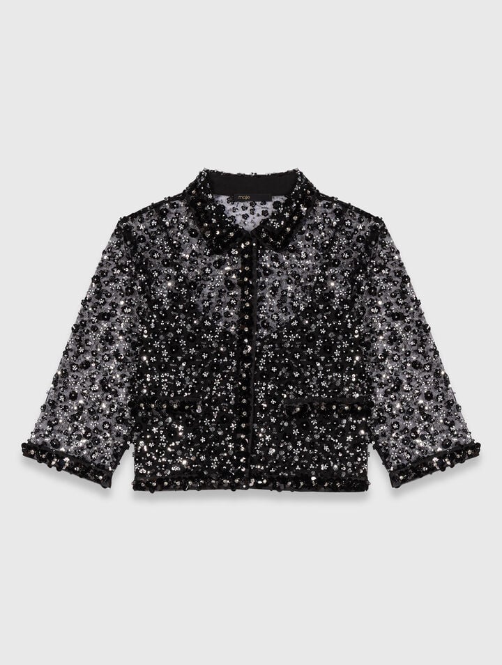 Polo strassé à motif floreal