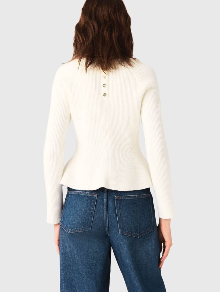 Pull en maille à taille péplum