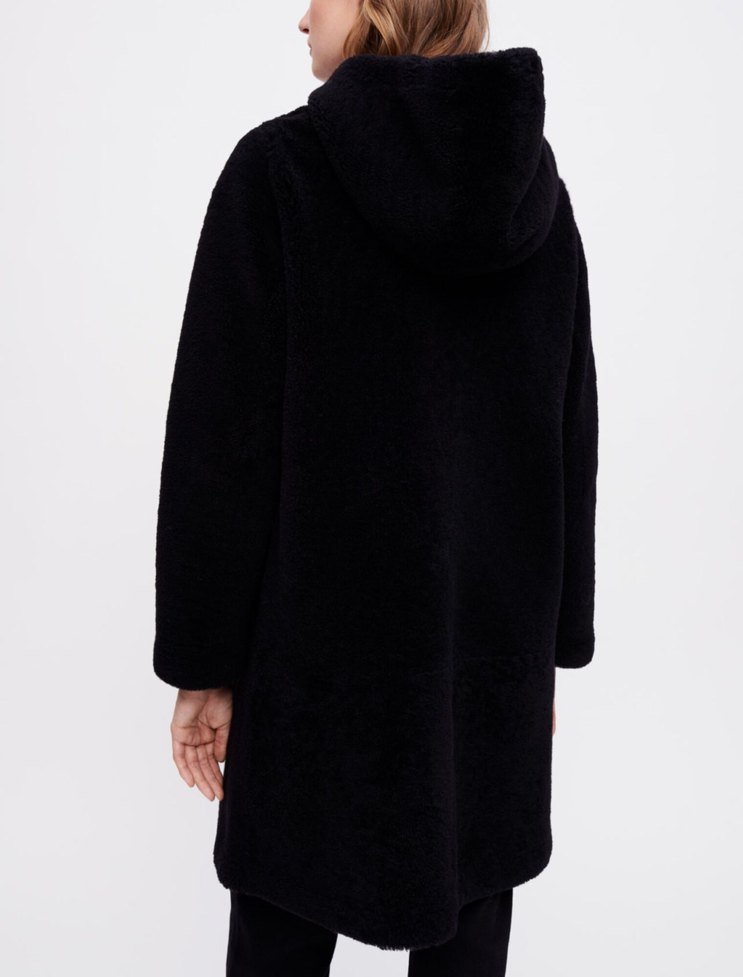 Manteau en peau lainée laine et cuir