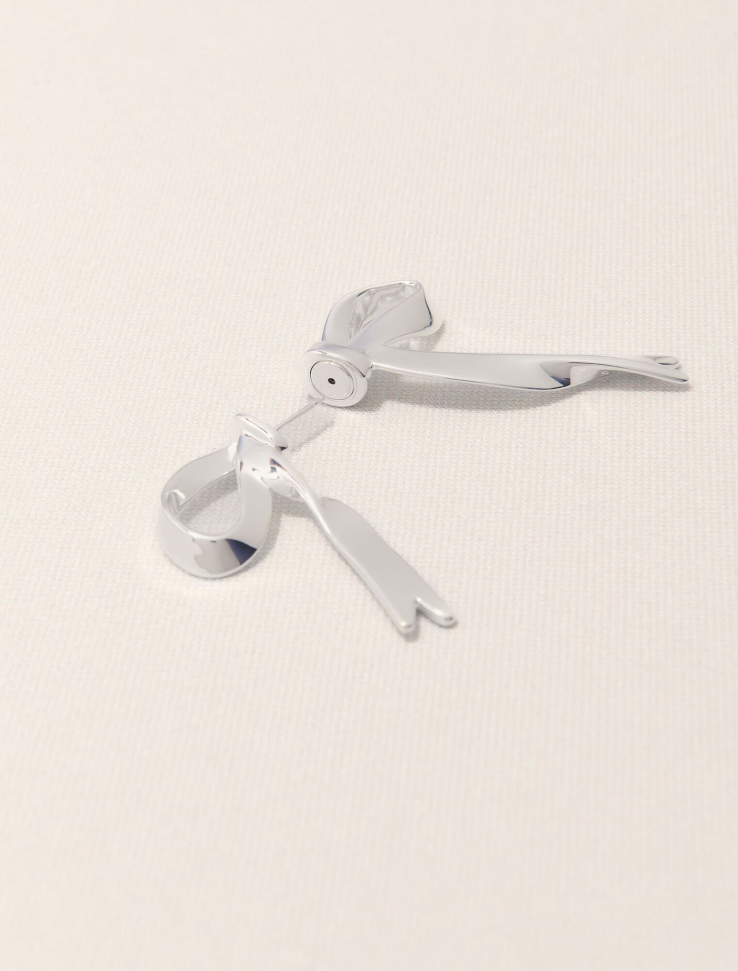 Boucle d'oreille nœud argentée