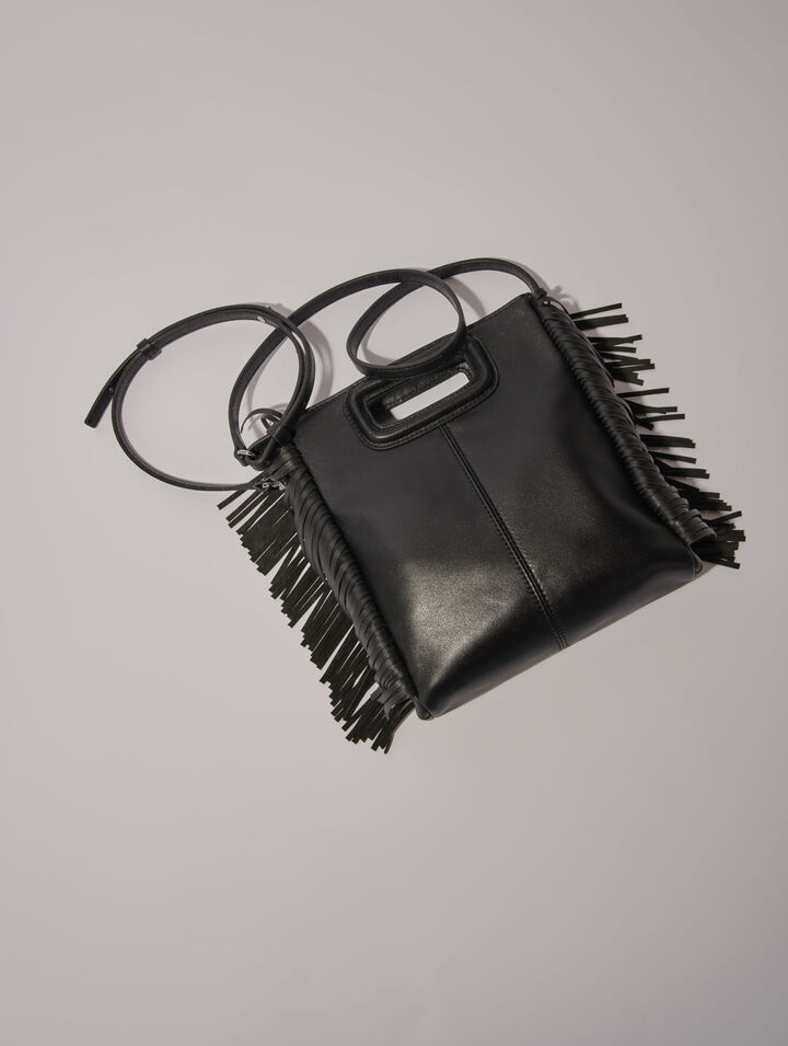 Sac M en cuir à œillets