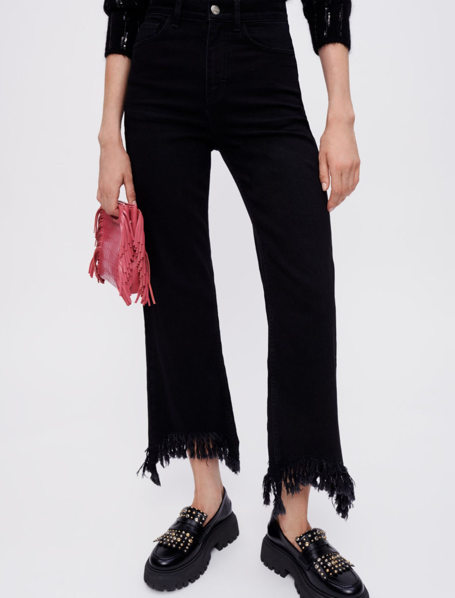 Jean noir taille haute déchiré en bas