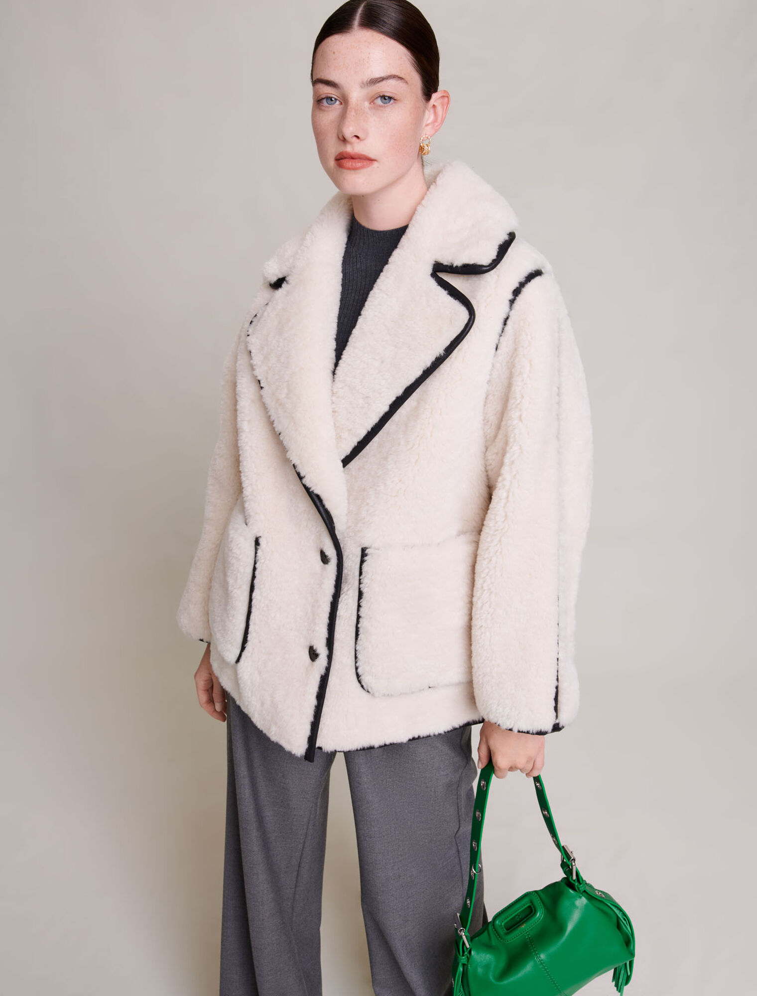 Manteau court en fausse fourrure