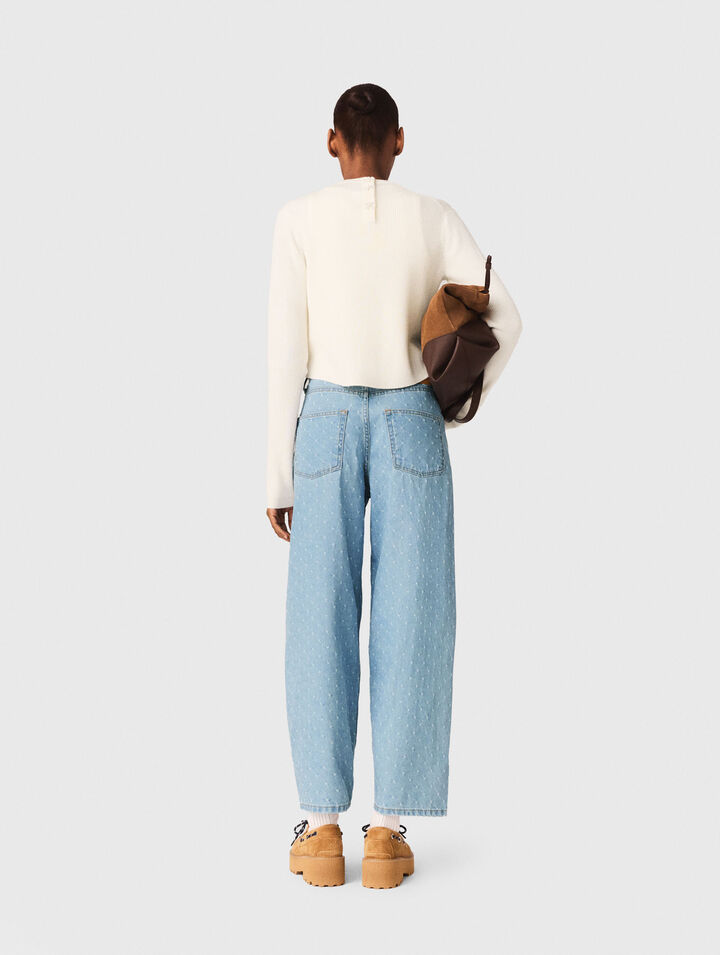 Pull avec boutons bijoux