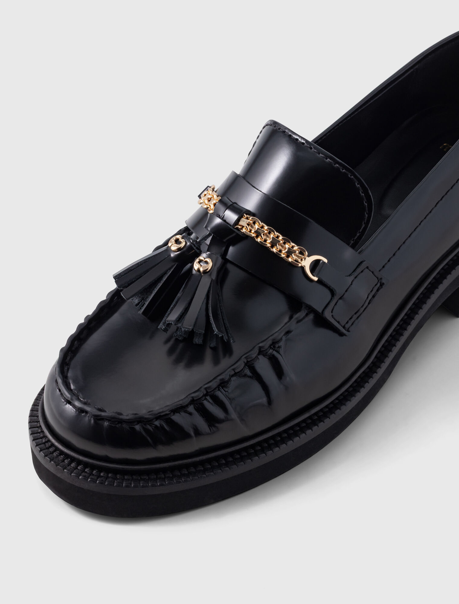 Mocassins en cuir &agrave; bords pliss&eacute;s