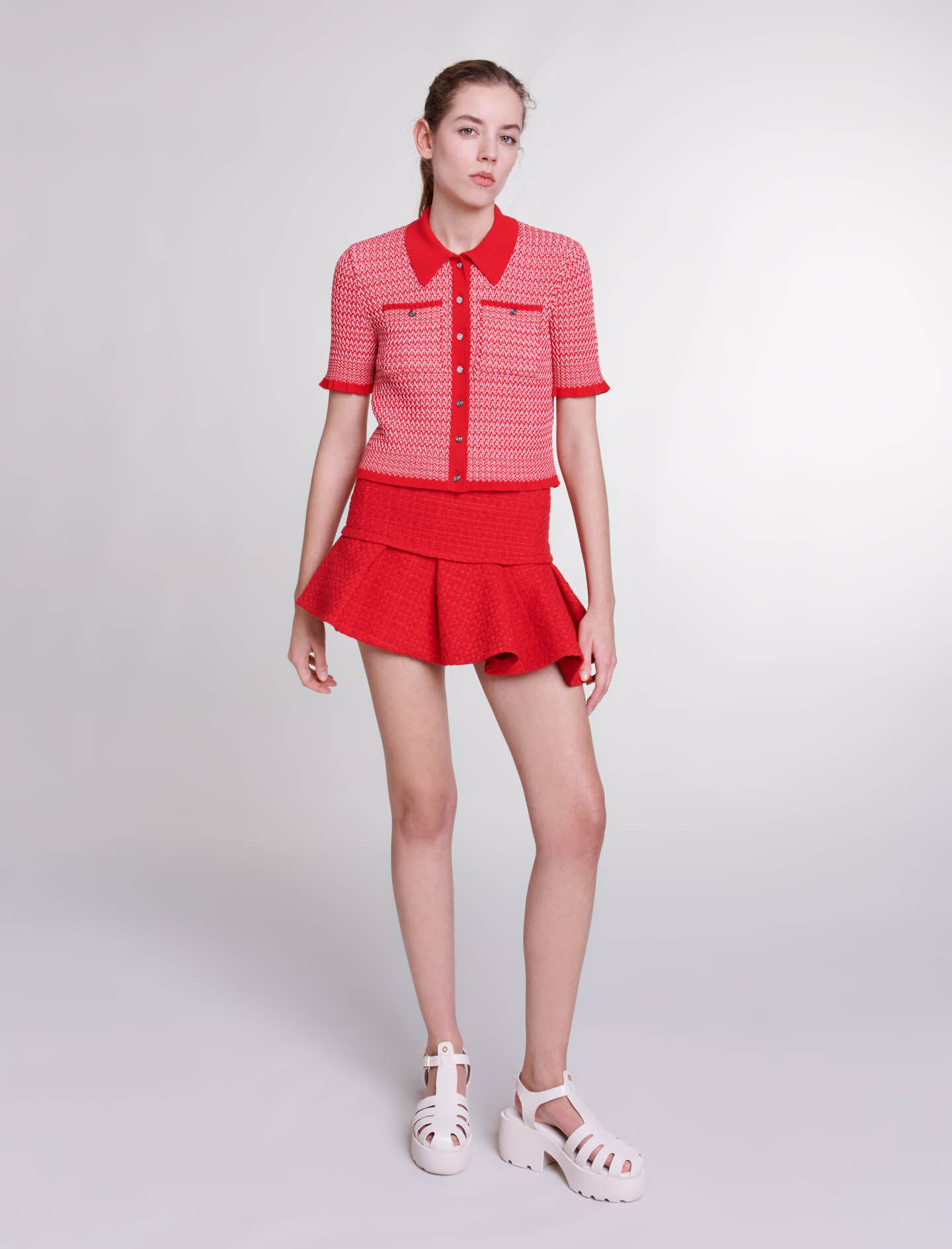 Mini jupe en tweed asymetrique