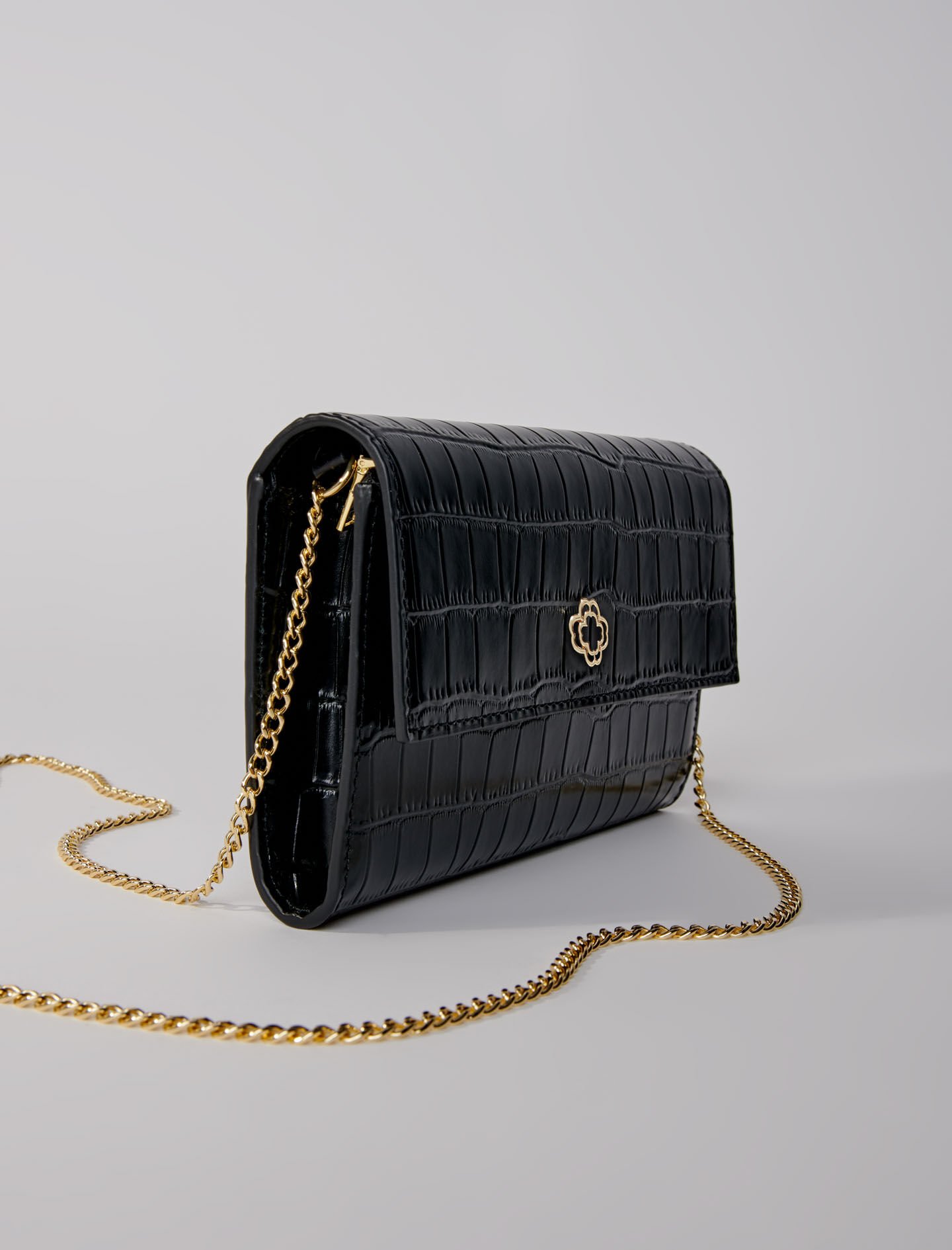 Sac pochette en cuir embosse Portefeuilles Maje