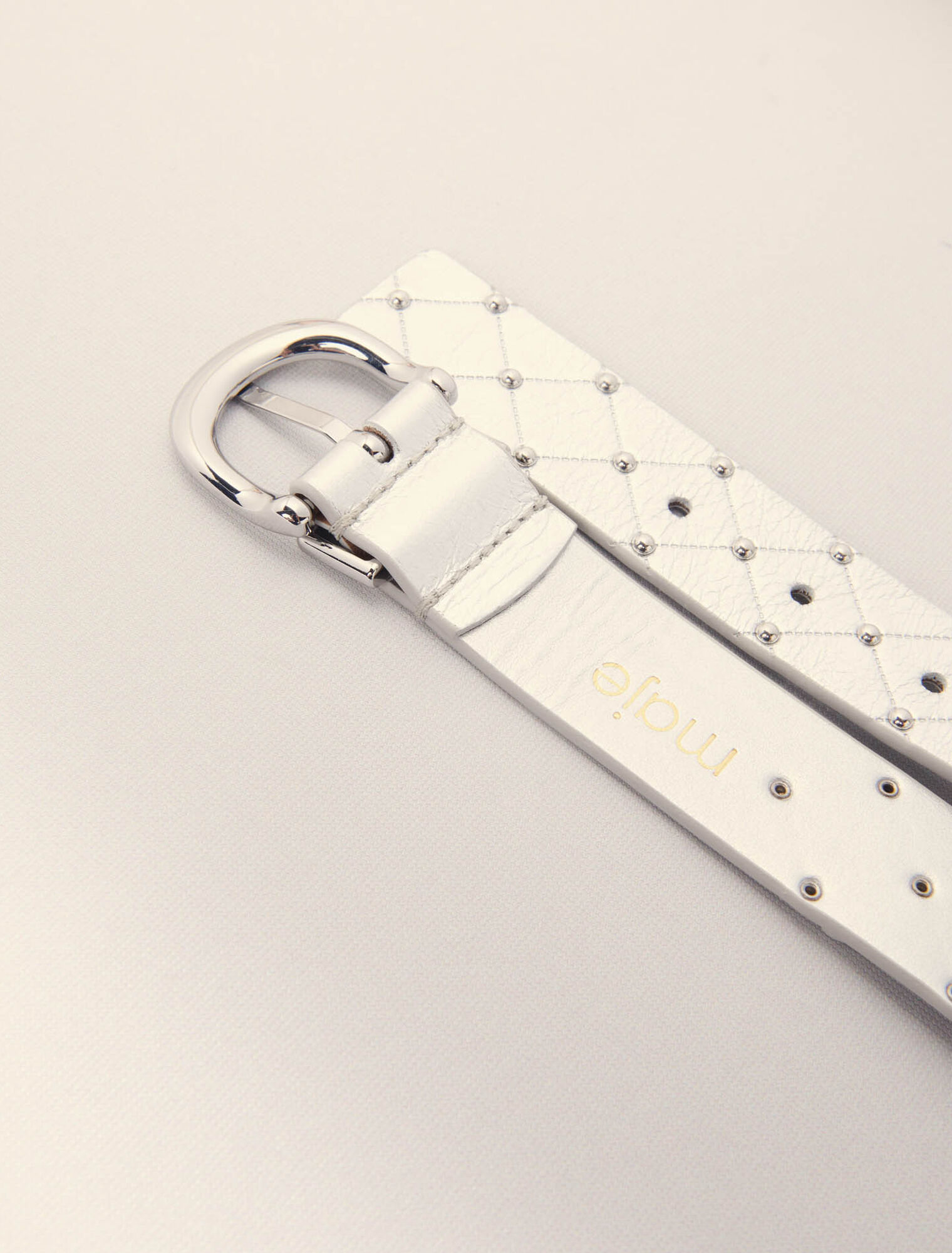 Ceinture en cuir métal matelassé