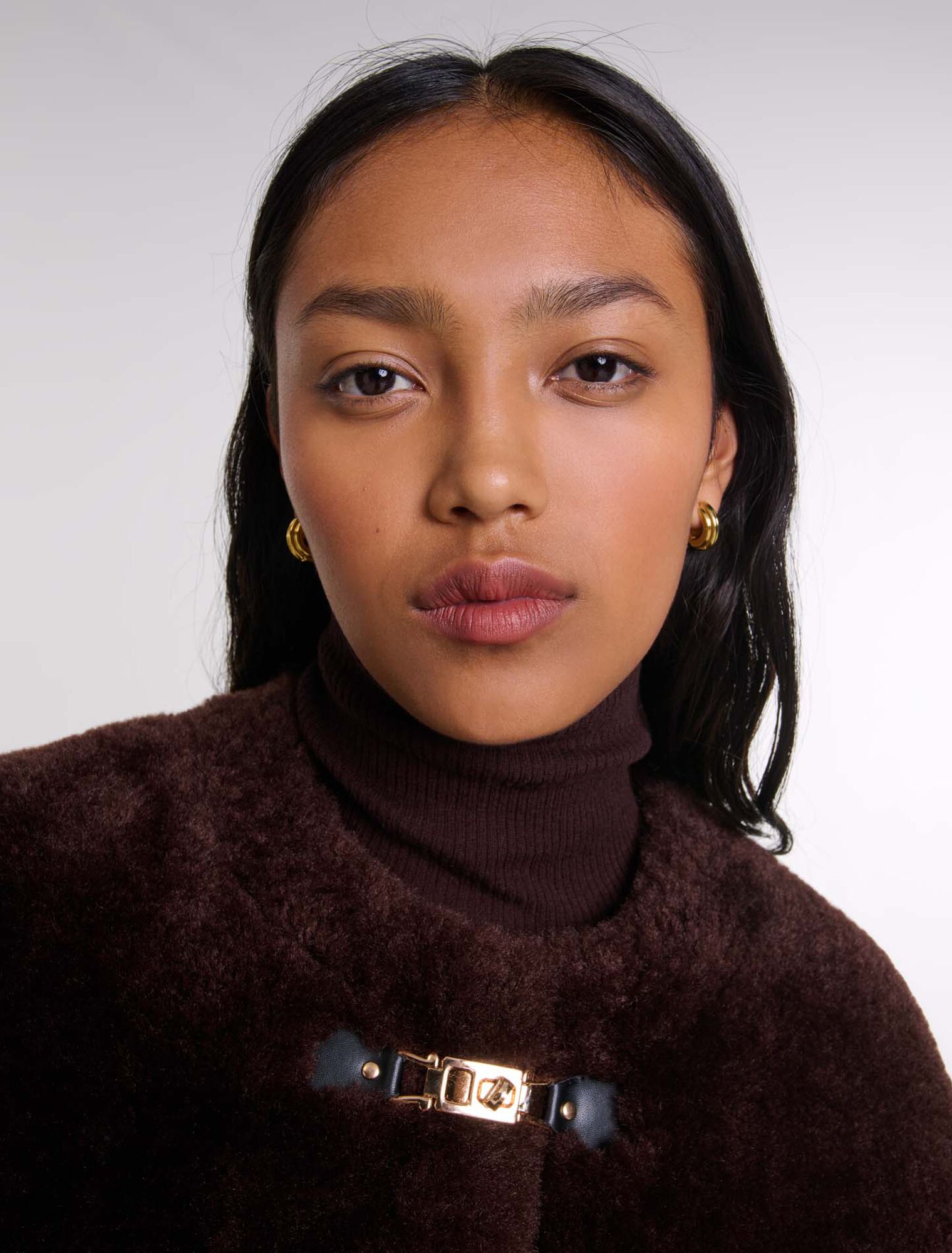 Manteau court en fausse fourrure