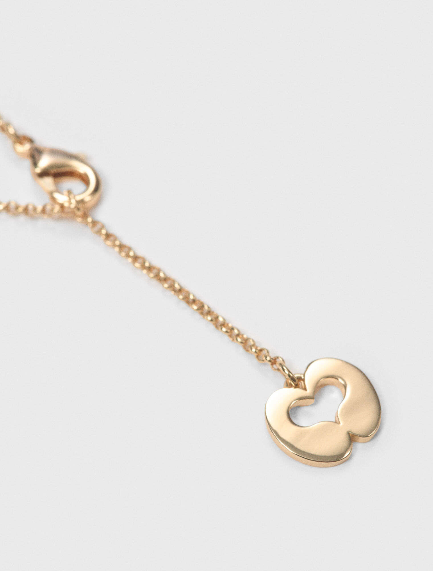 Collier double &agrave; charms strass&eacute;s