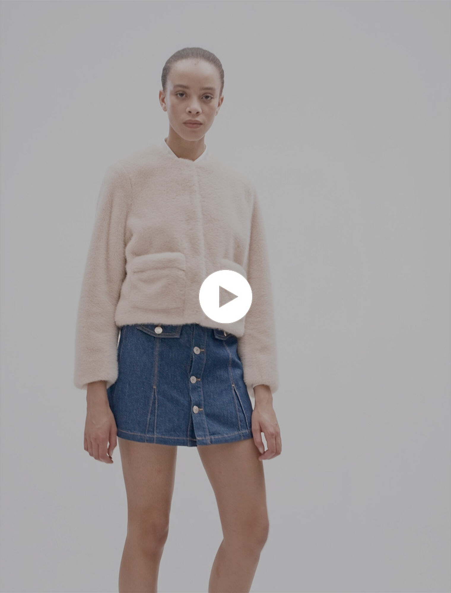 Veste courte en fausse fourrure