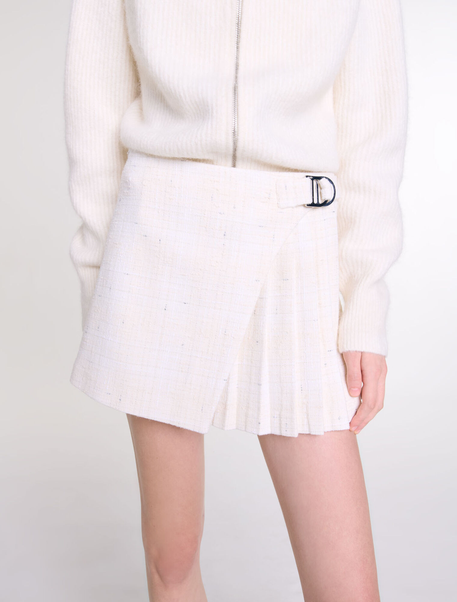 Jupe short plissée en tweed