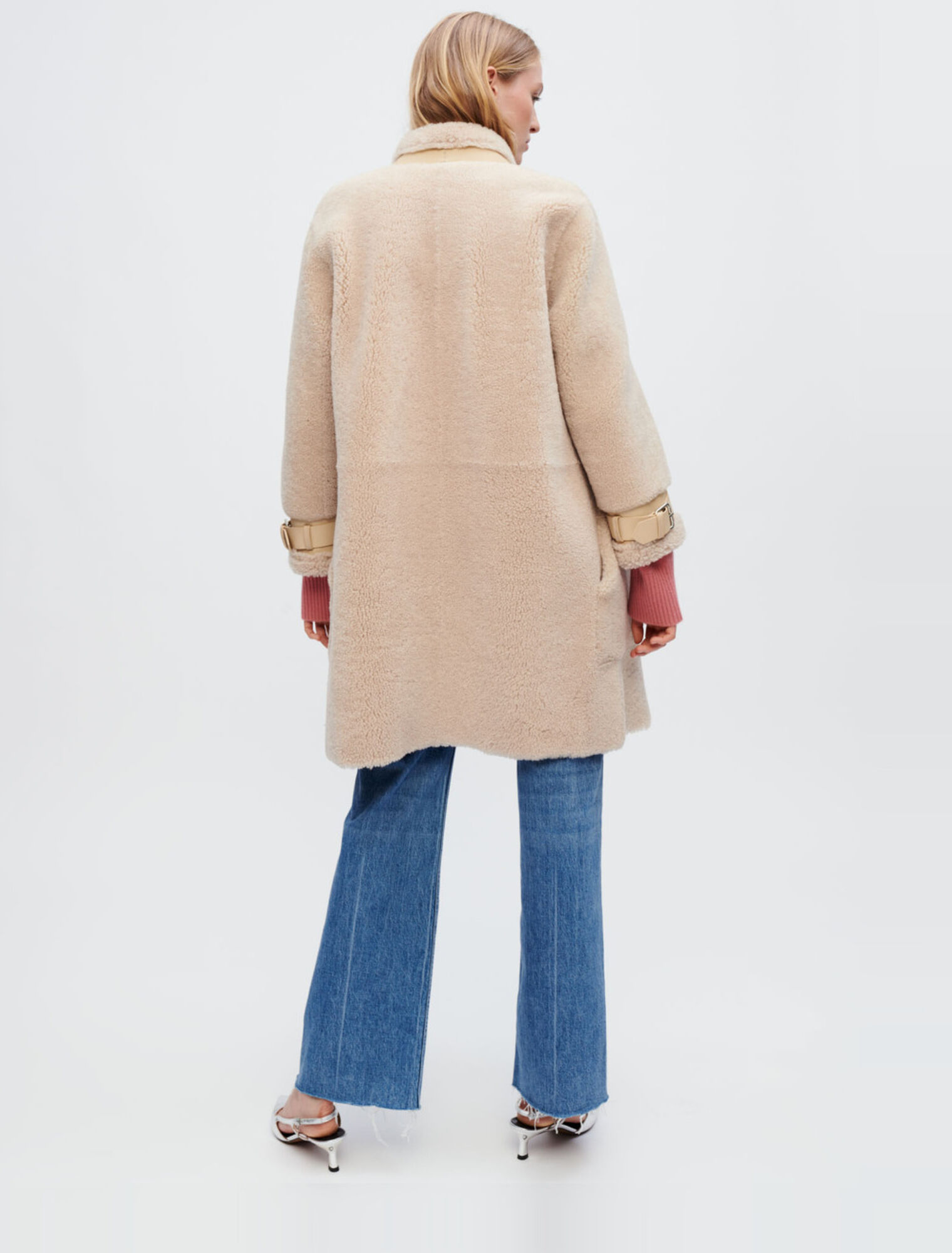 Manteau en peau lainée et cuir