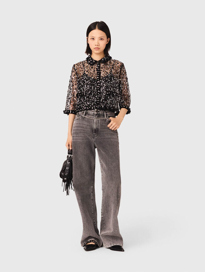 Polo strassé à motif floreal