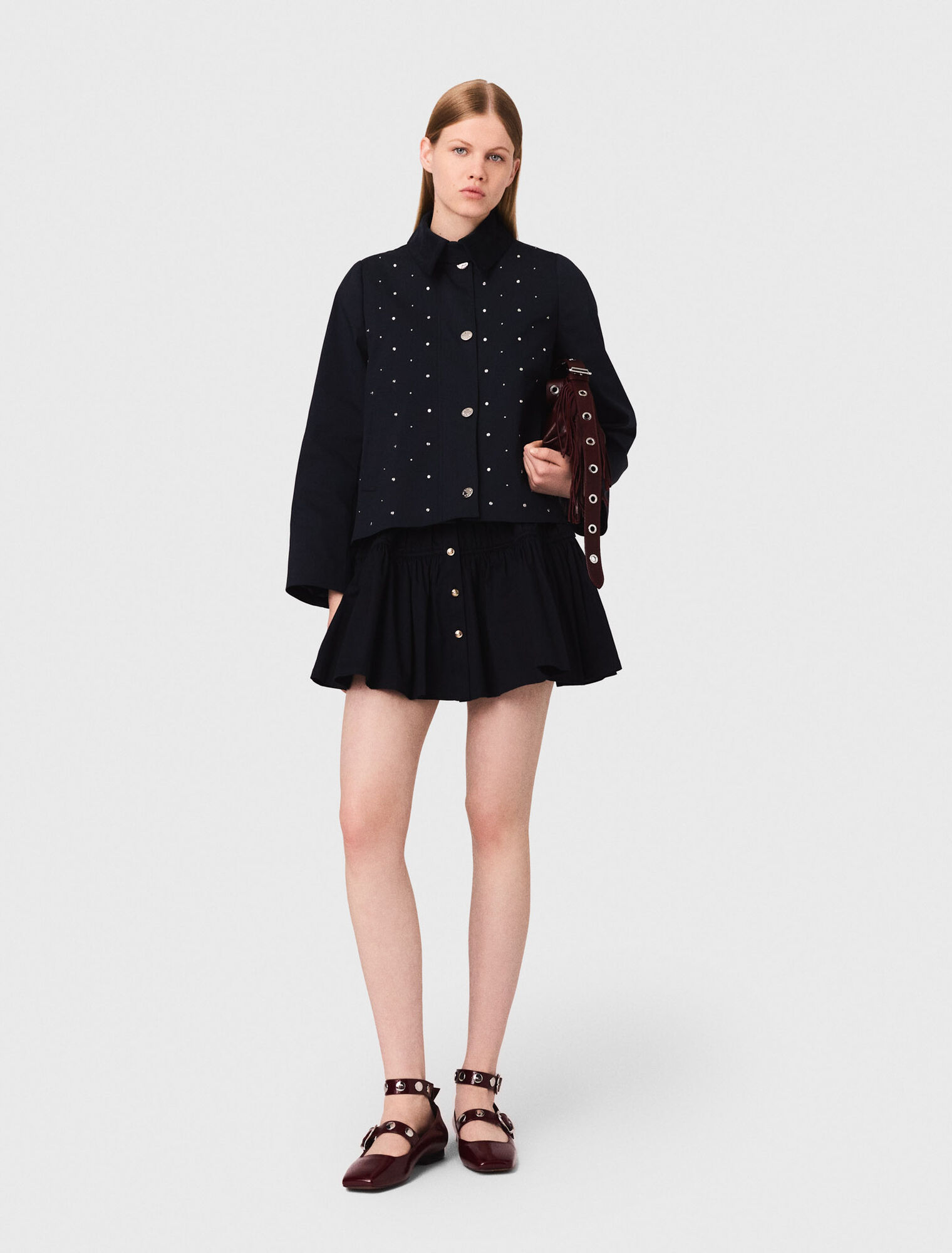 Veste courte col velours et clous