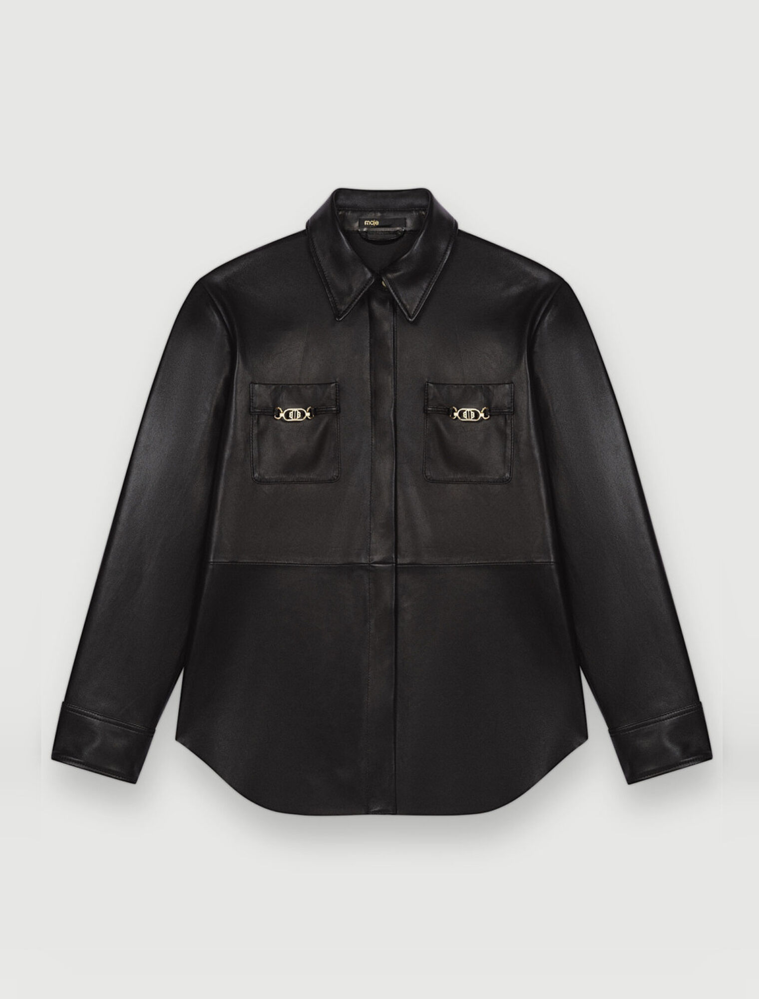 Chemise en cuir noir à mors dorés