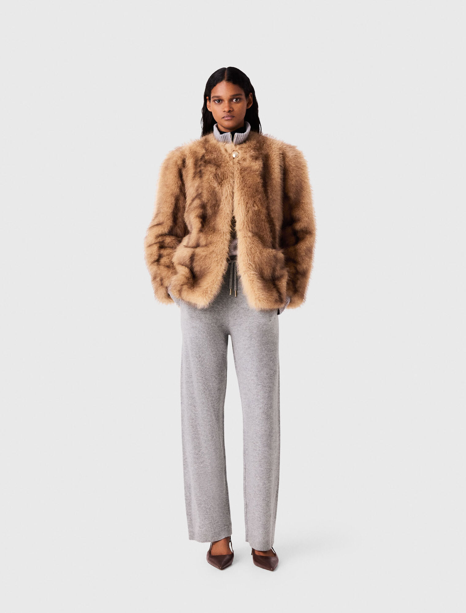 Manteau mi-long en fausse fourrure