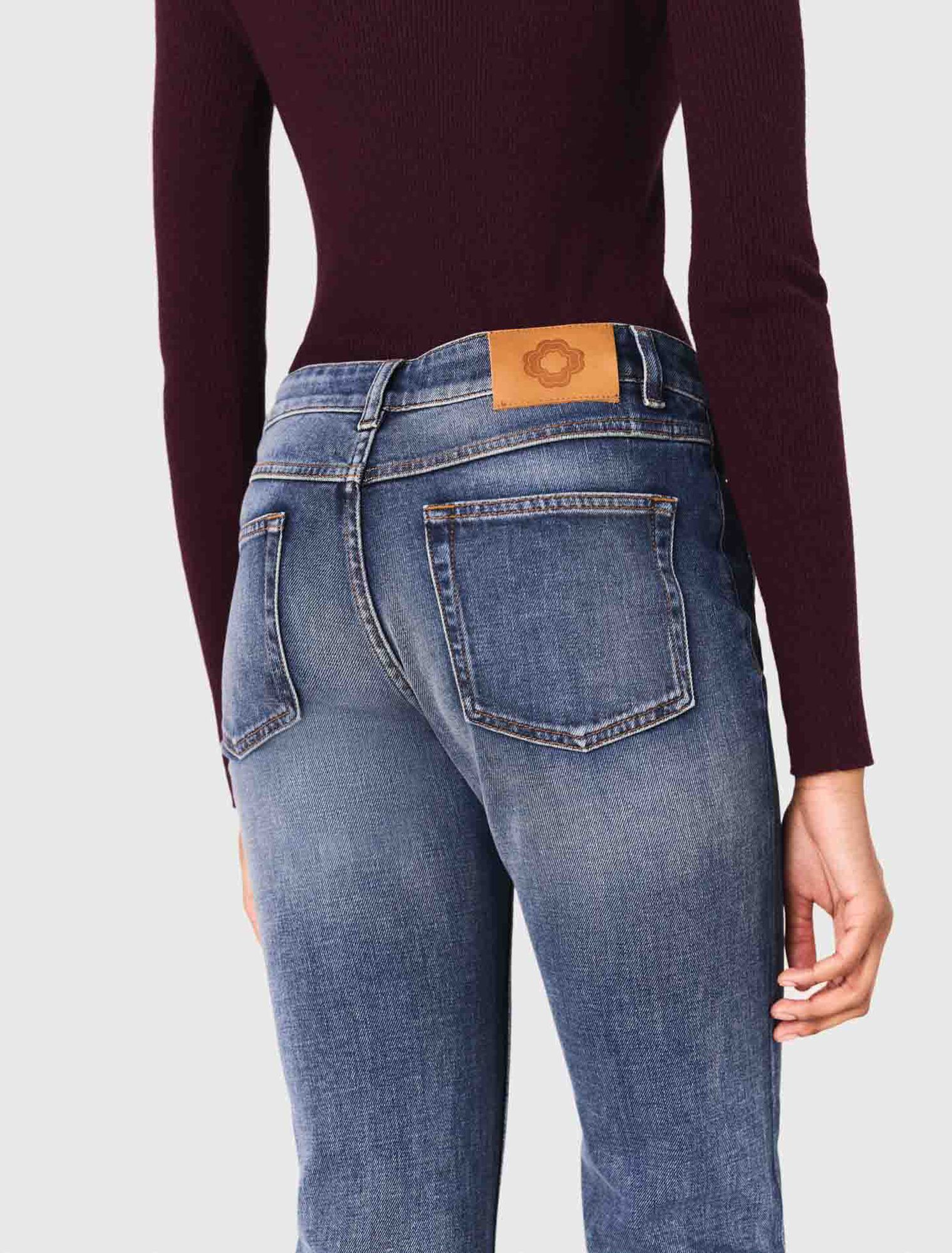 Jean bootcut à poches zippées