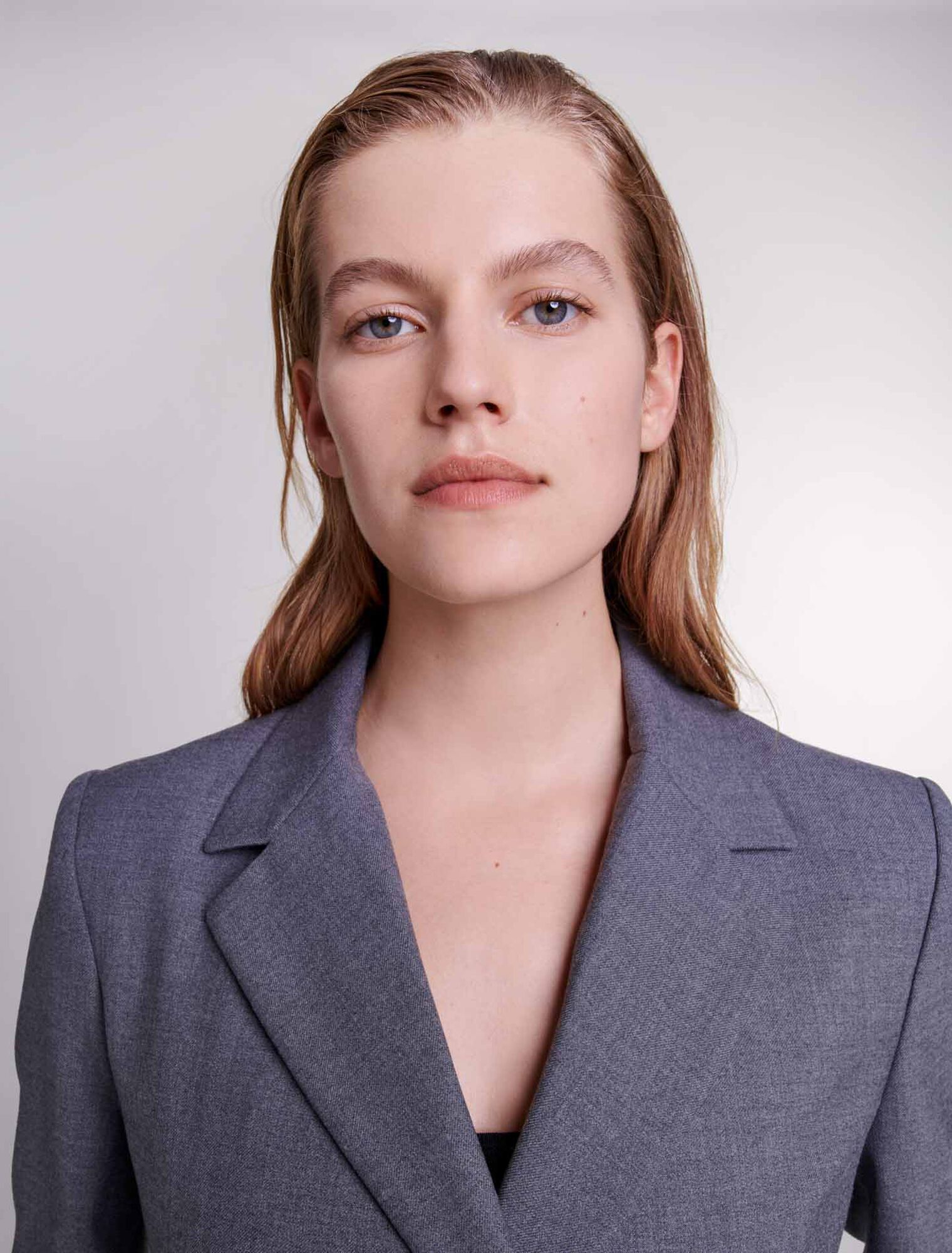Veste de tailleur à ceinture chaîne