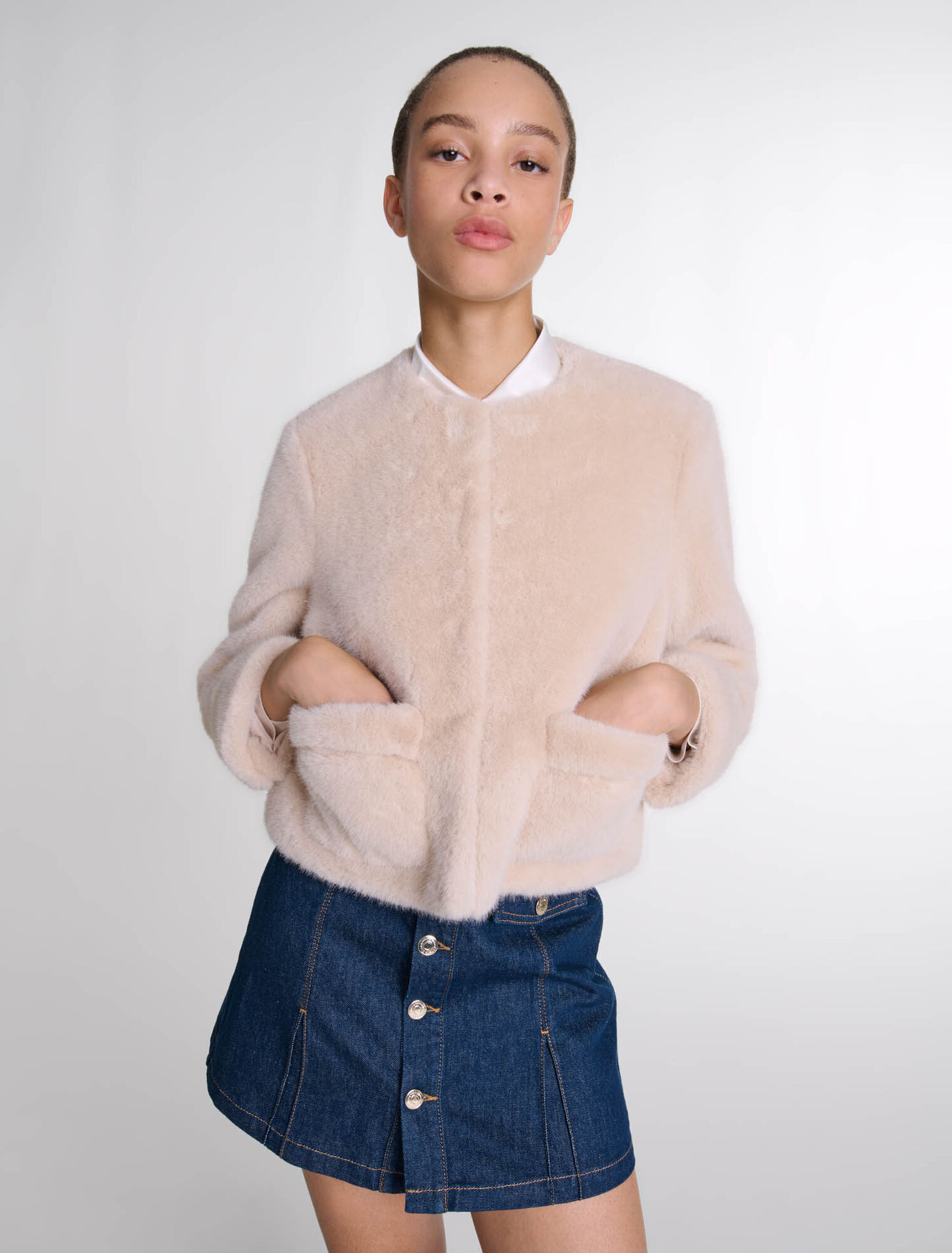 Veste courte en fausse fourrure