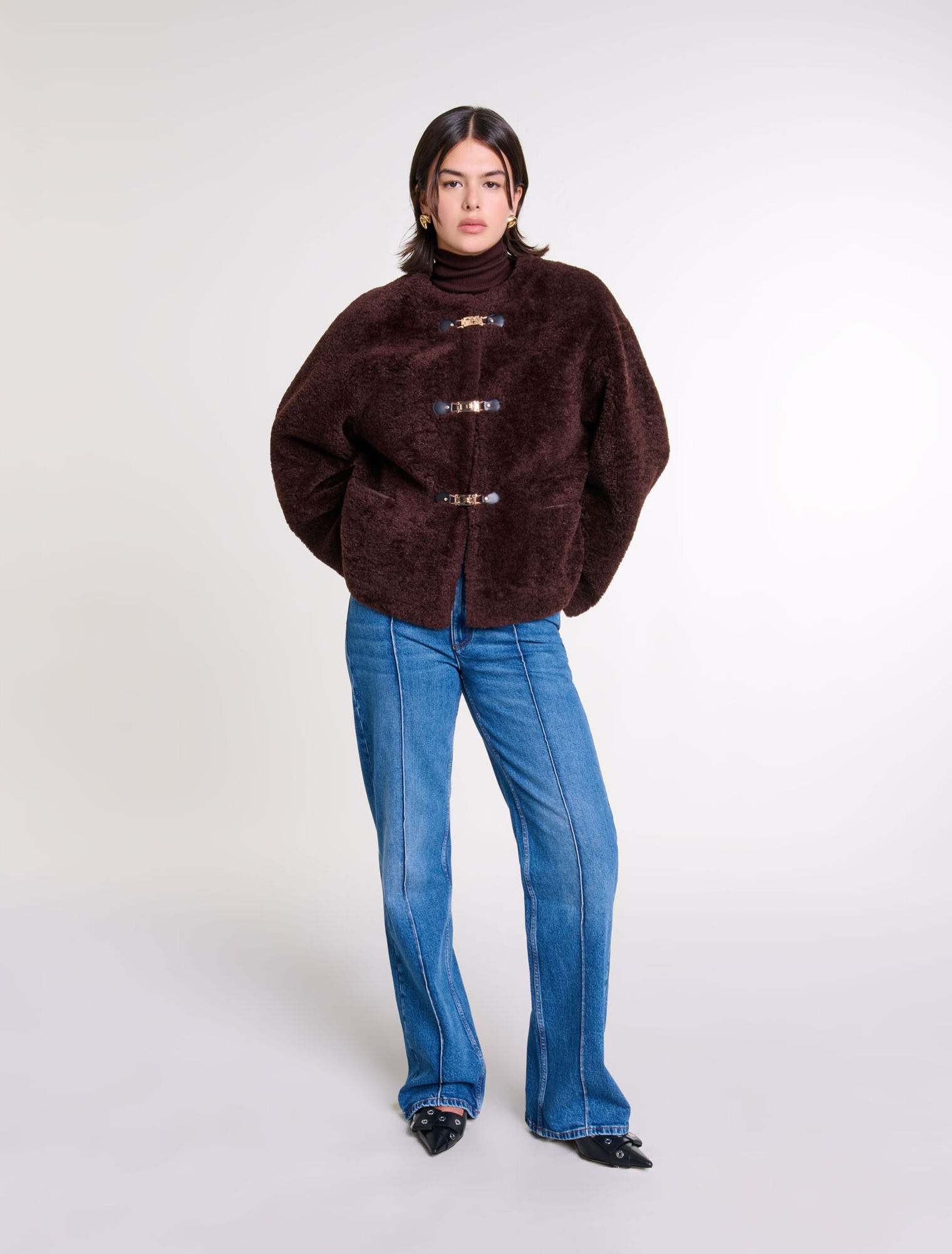 Manteau court en fausse fourrure