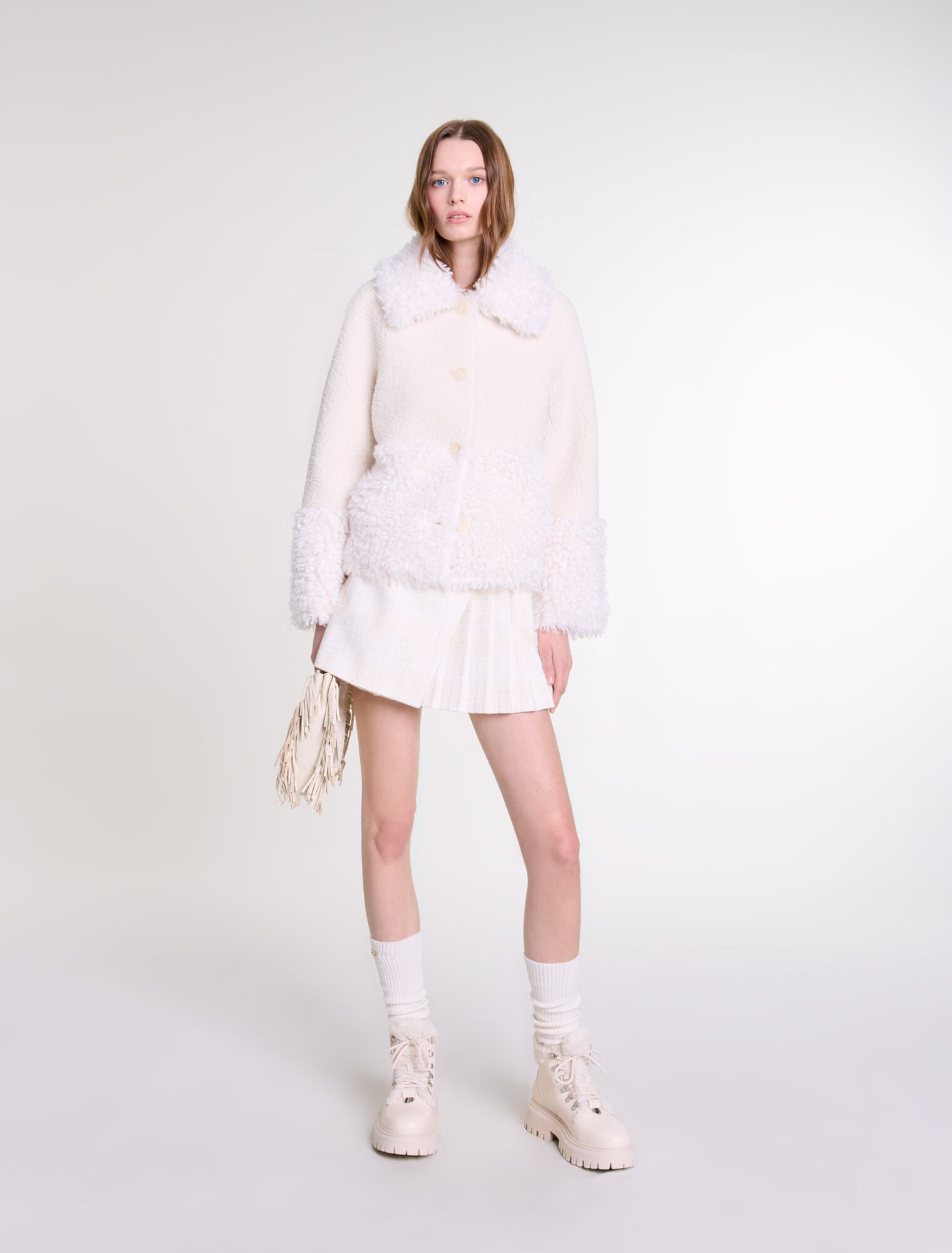 Manteau court fausse fourrure