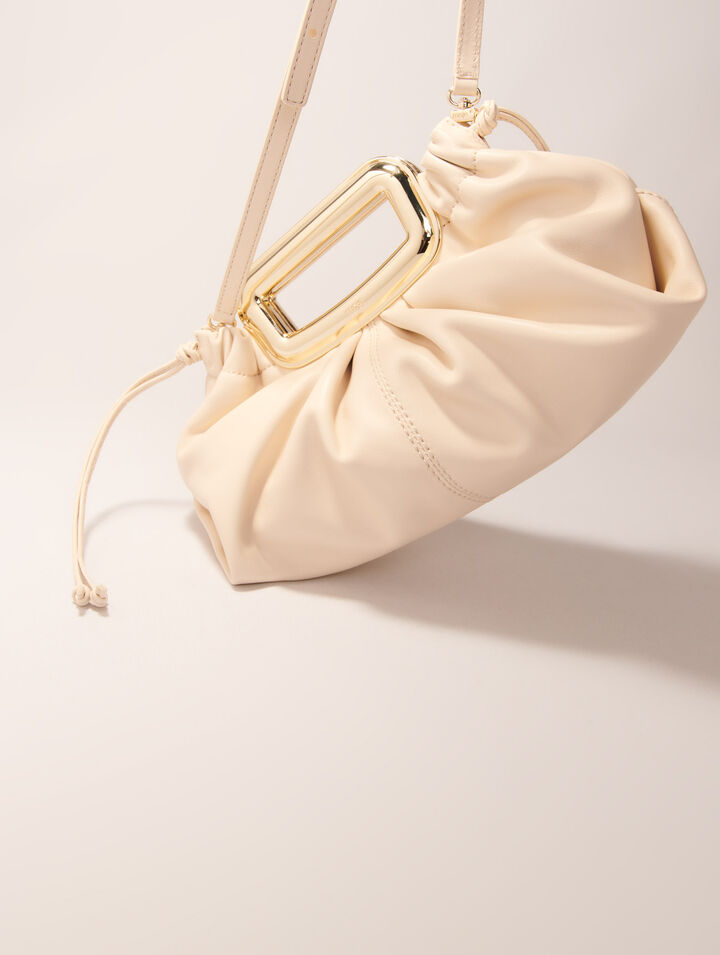 Clutch en cuir et poignée métal