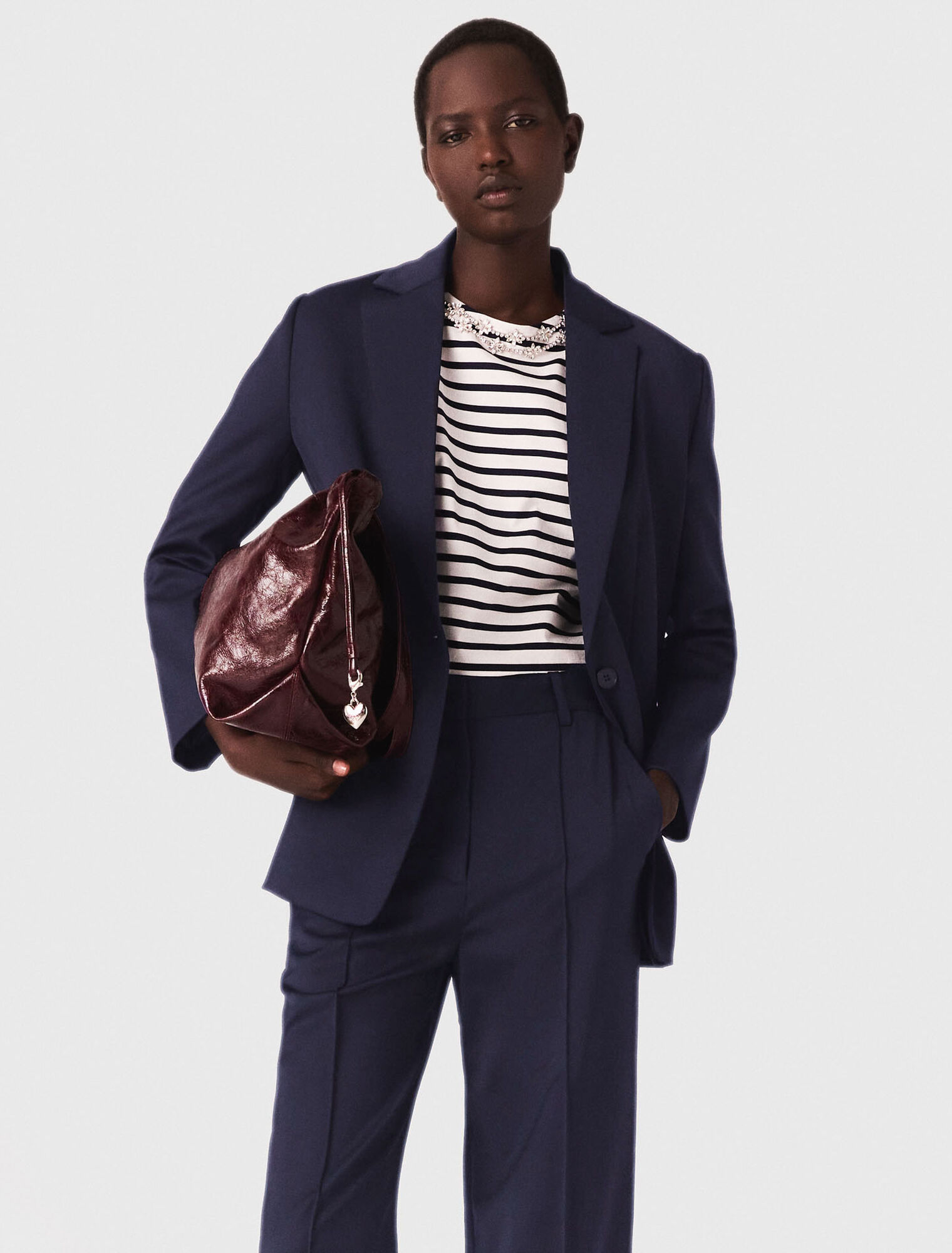 Veste tailleur avec dos plissé