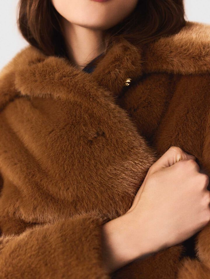 Manteau mi-long en fausse fourrure