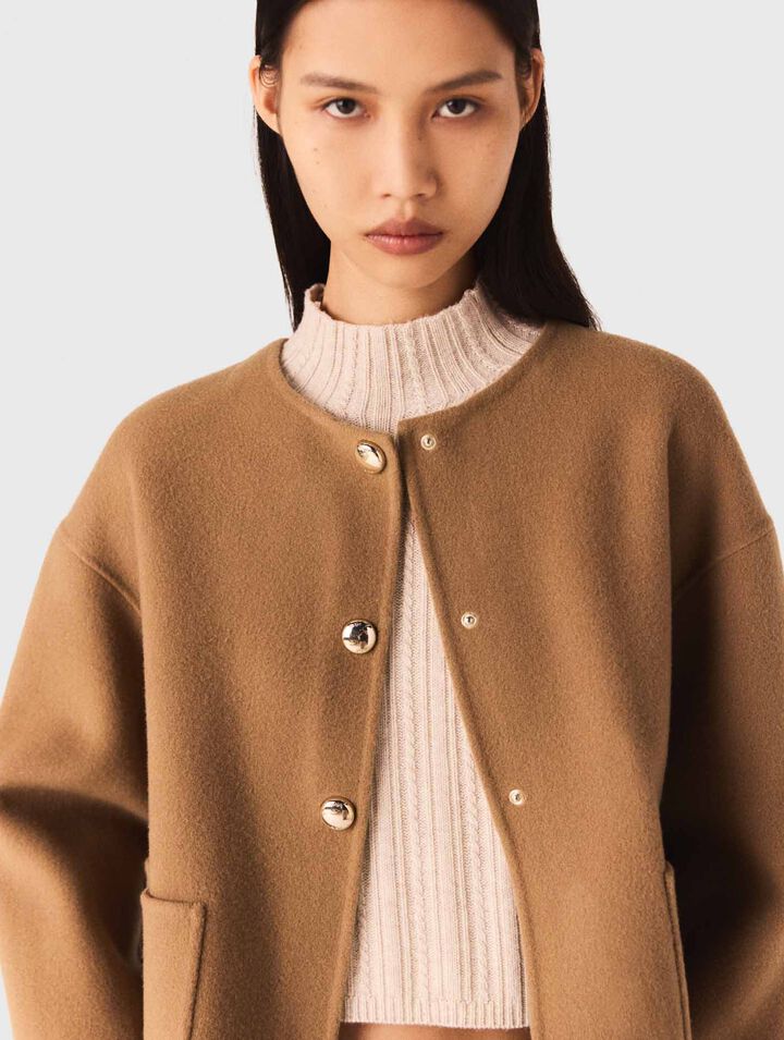 Manteau double face et col en cuir