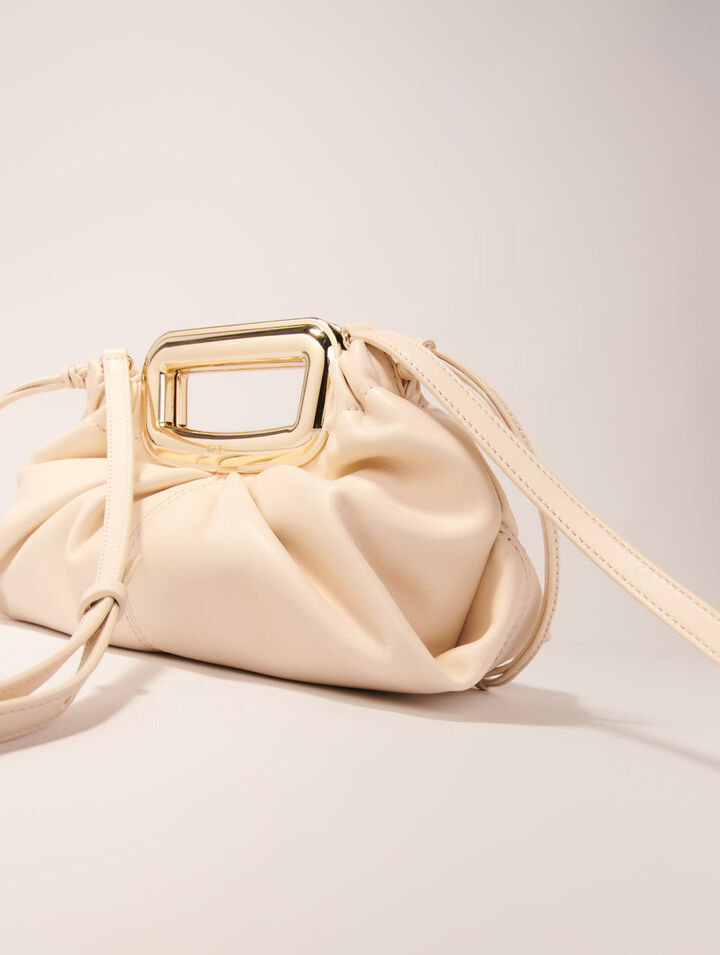 Clutch en cuir et poignée métal