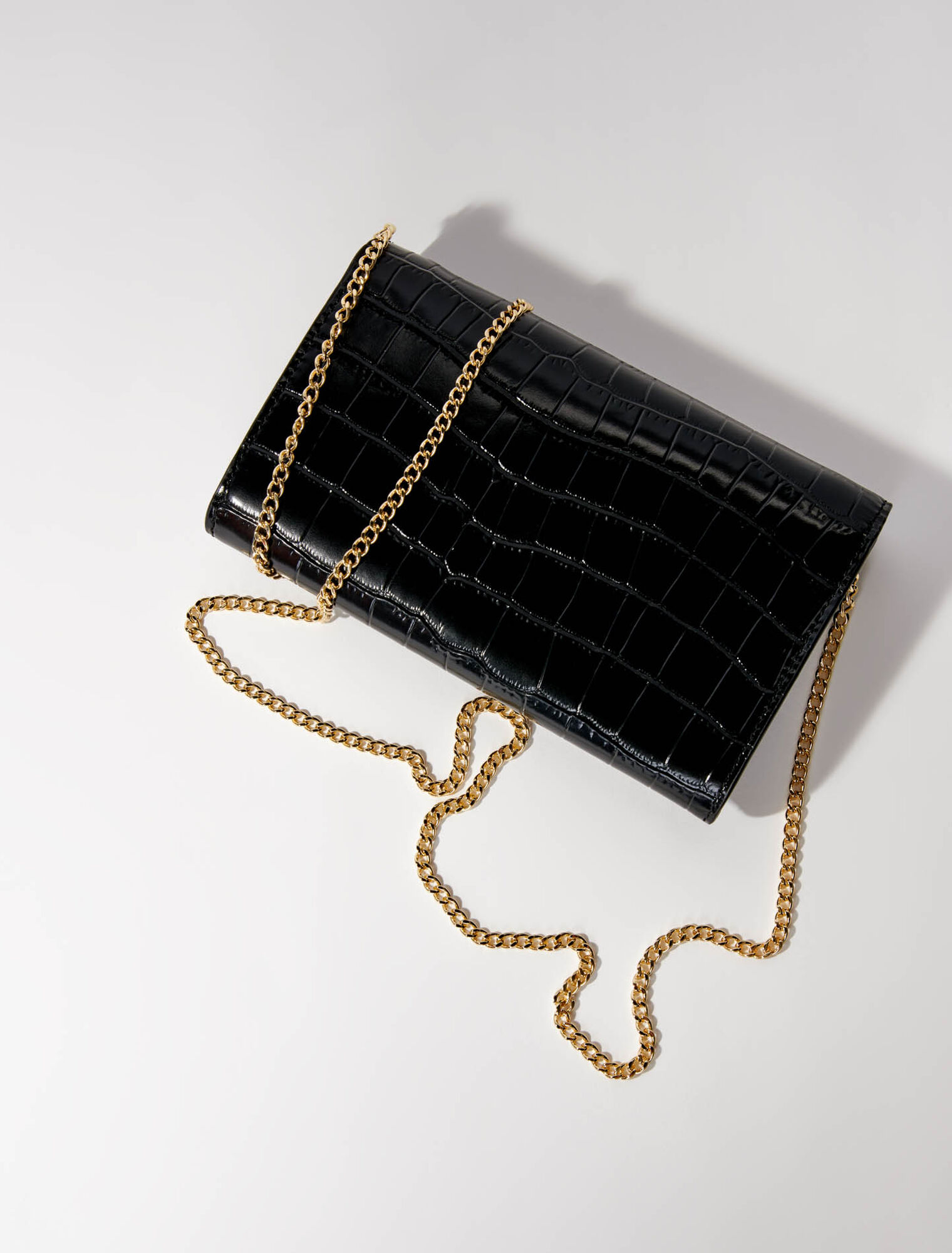 Sac pochette en cuir embossé