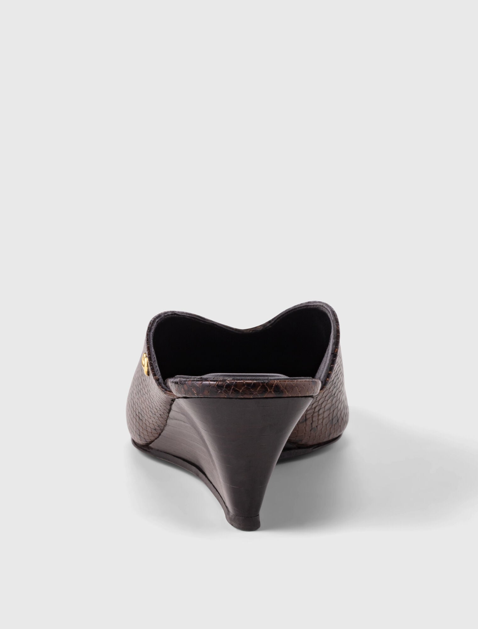 Mules compens&eacute;es en cuir emboss&eacute;