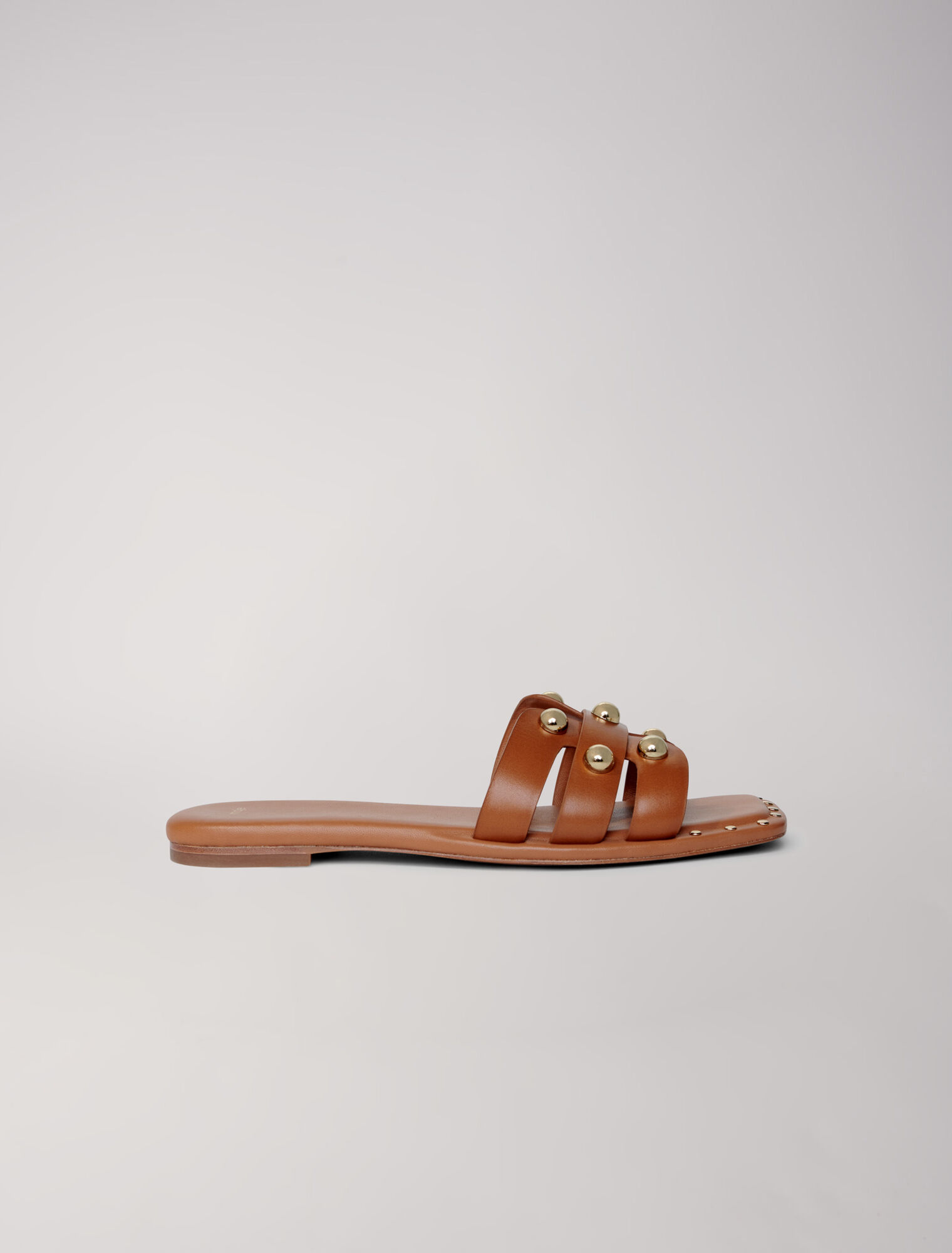 Mules en cuir ornées de studs