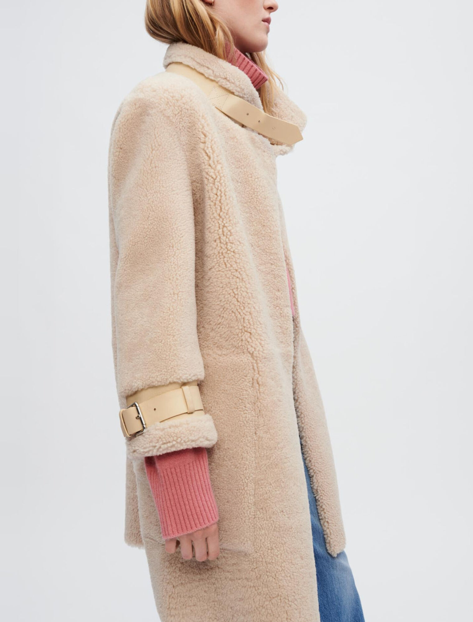 Manteau en peau lainée et cuir