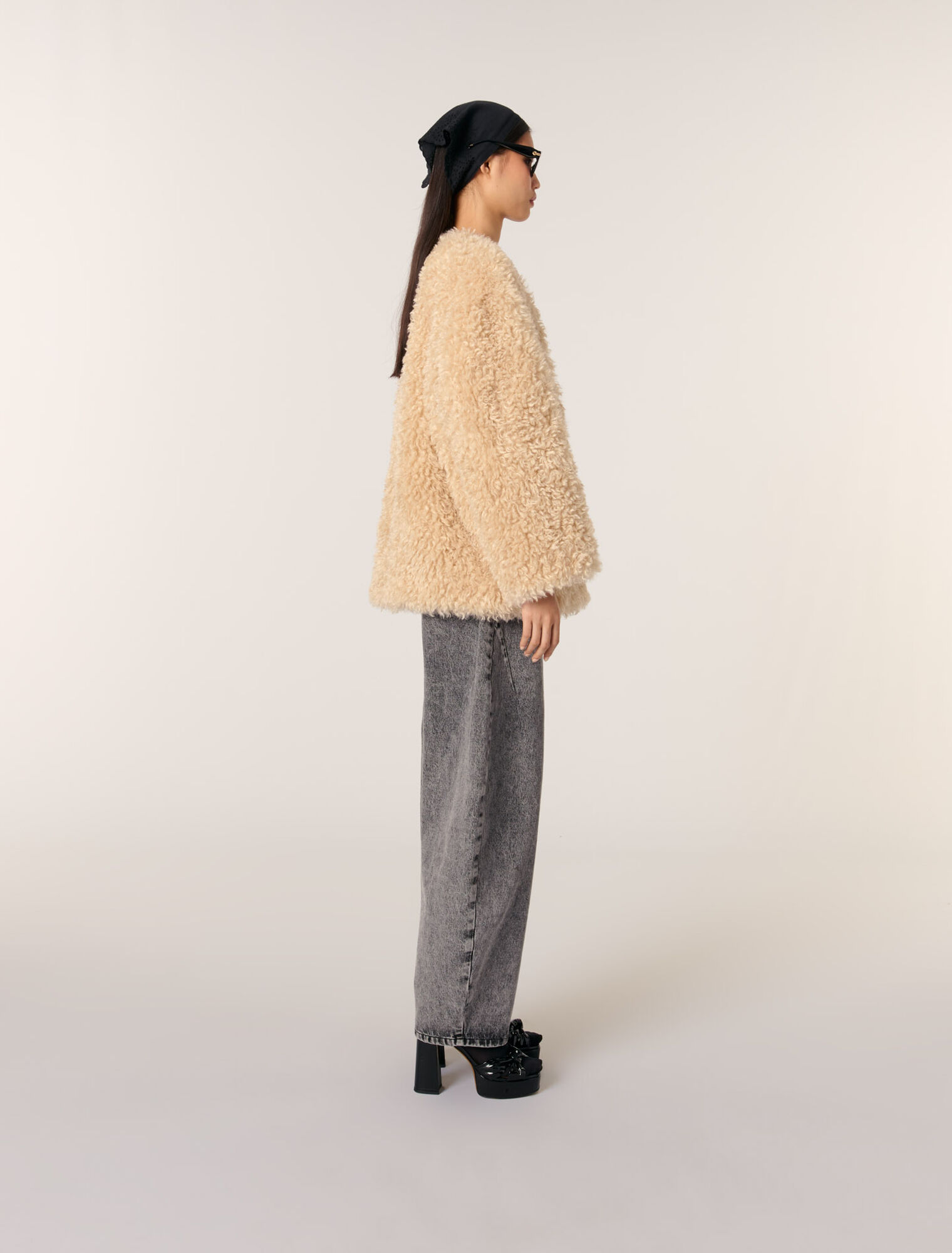 Manteau court en fausse fourrure
